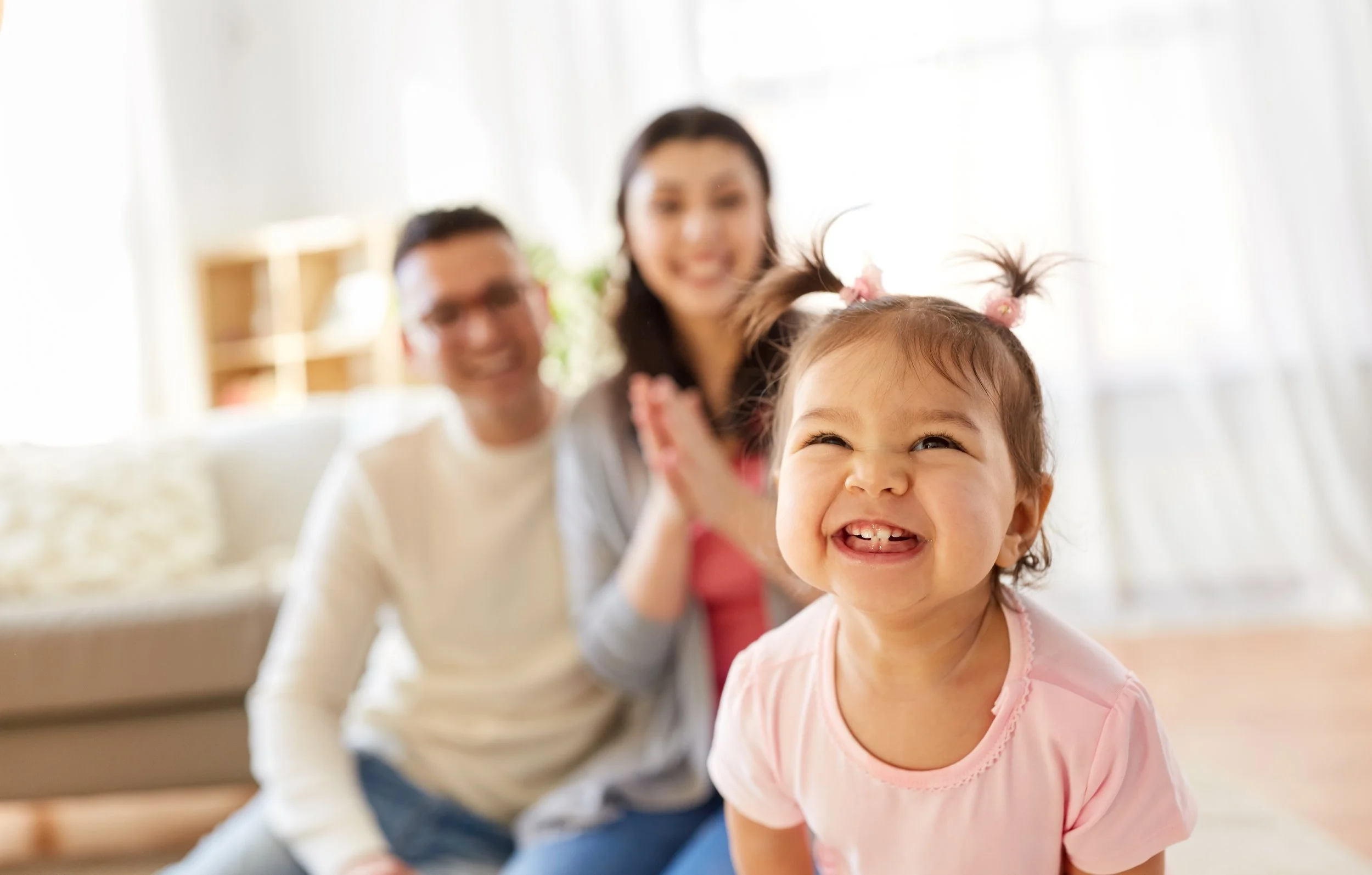 Smiling girl with pigtails