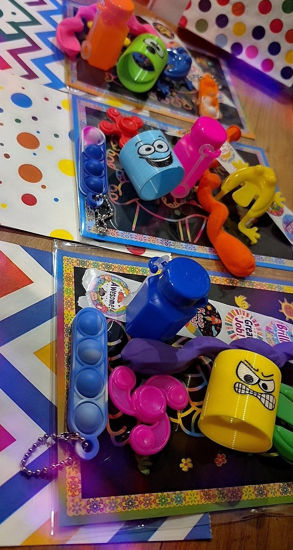 Celebration creations party bags, childrens birthdays, party favours, jumping frog toy, bubbles, party time, swirly balloon, stickers, pop it, slinkys, fidget spinner