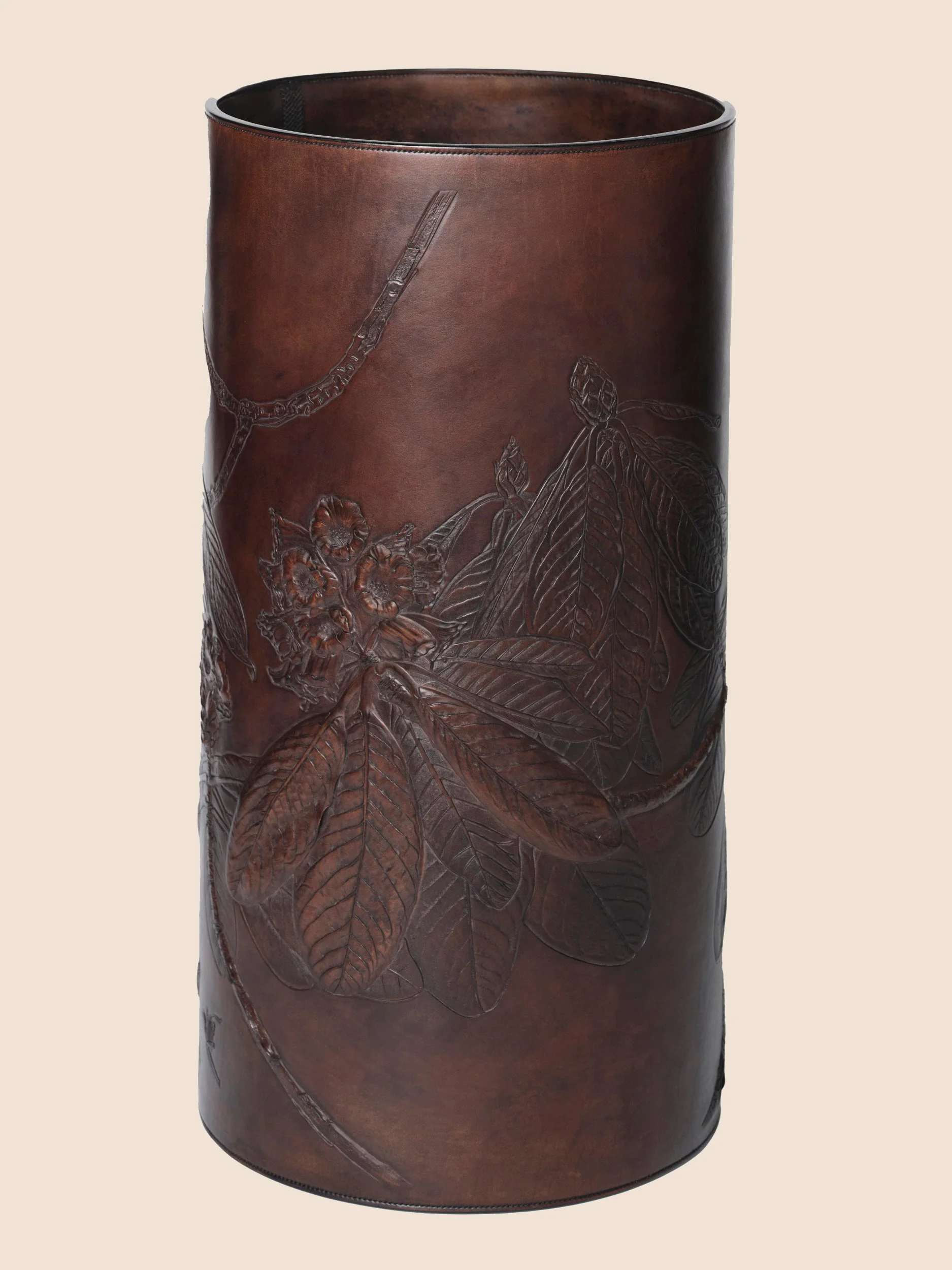 Rhododendron sinogrande, carved decorative leather vessel.