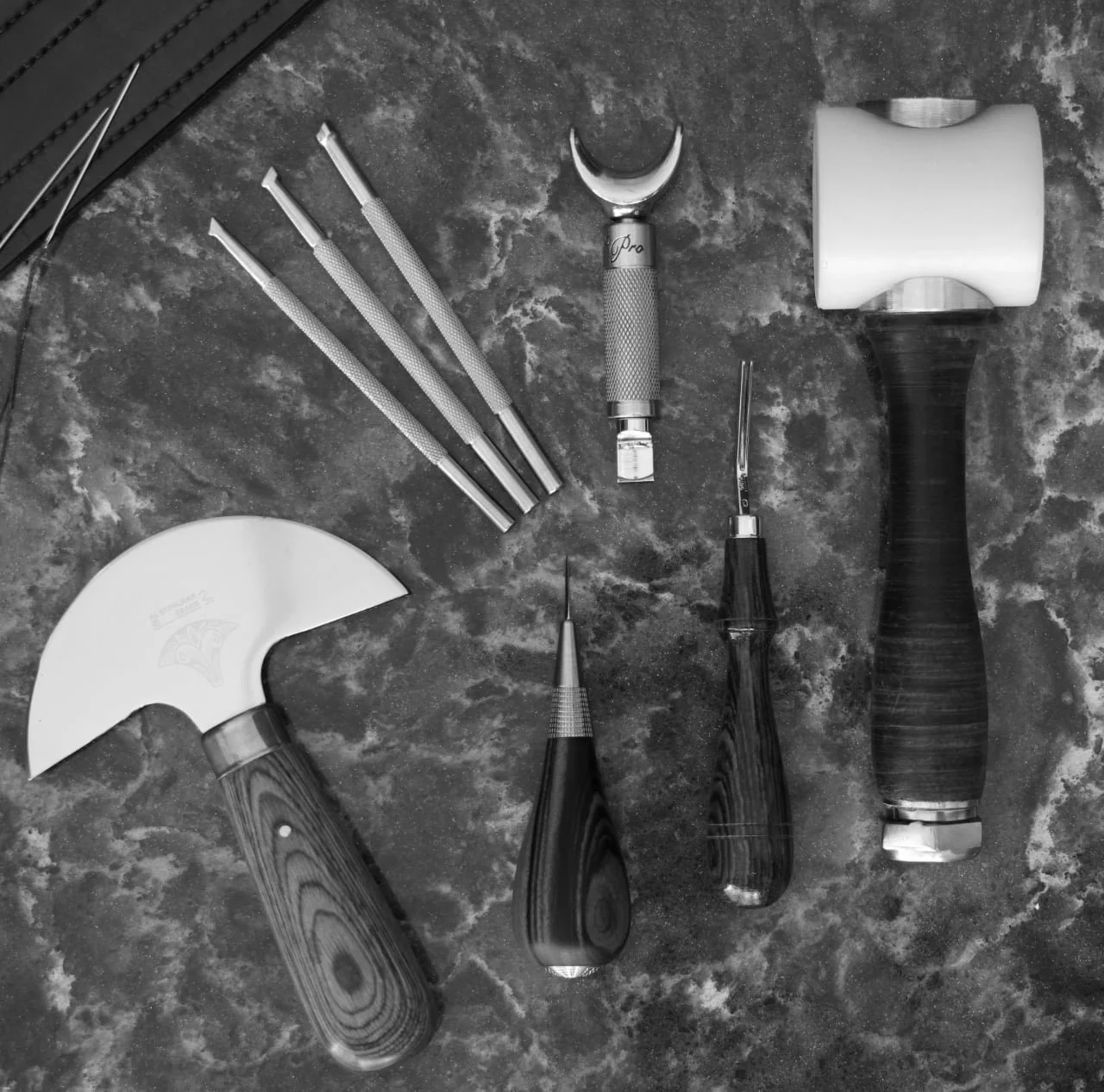 Collection of leather working tools.