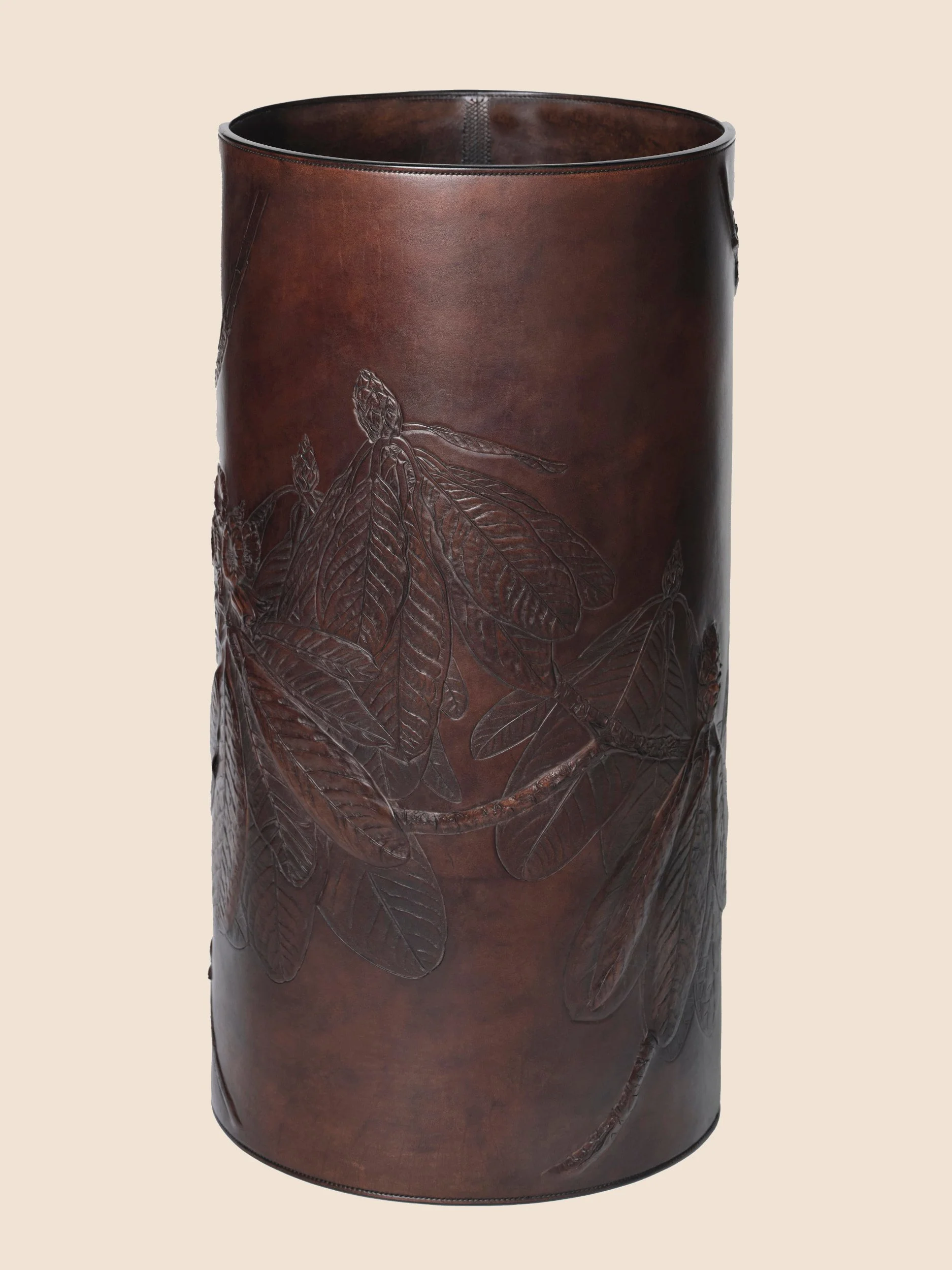 Rhododendron sinogrande, carved decorative leather vessel.