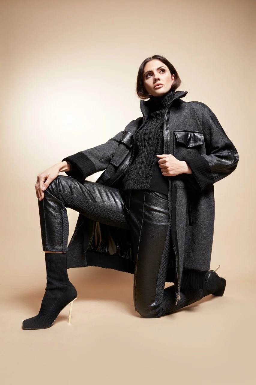 tricot-chic-gallery-leather-coat-seated.jpeg