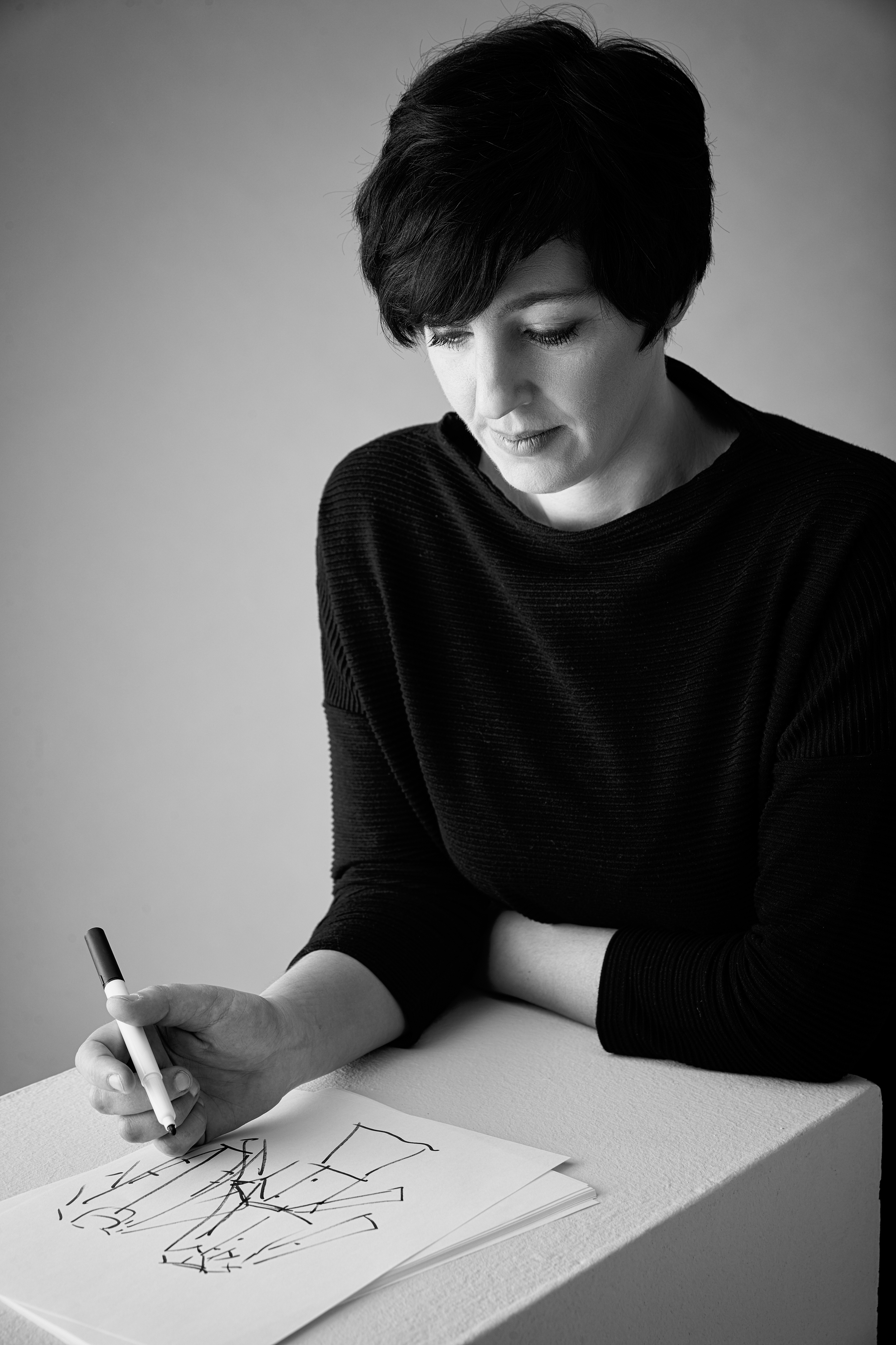 Simone Brehm, founder and designer of FOX'S, portrait in black turtleneck