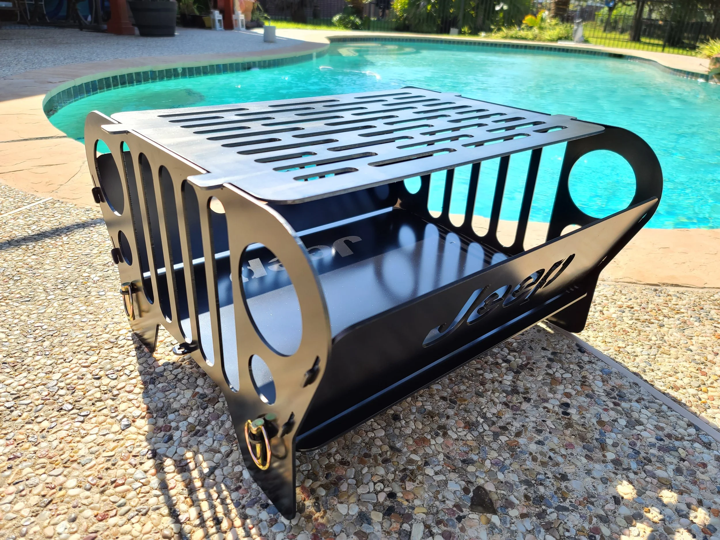 jeep fire pit by pool2.jpg