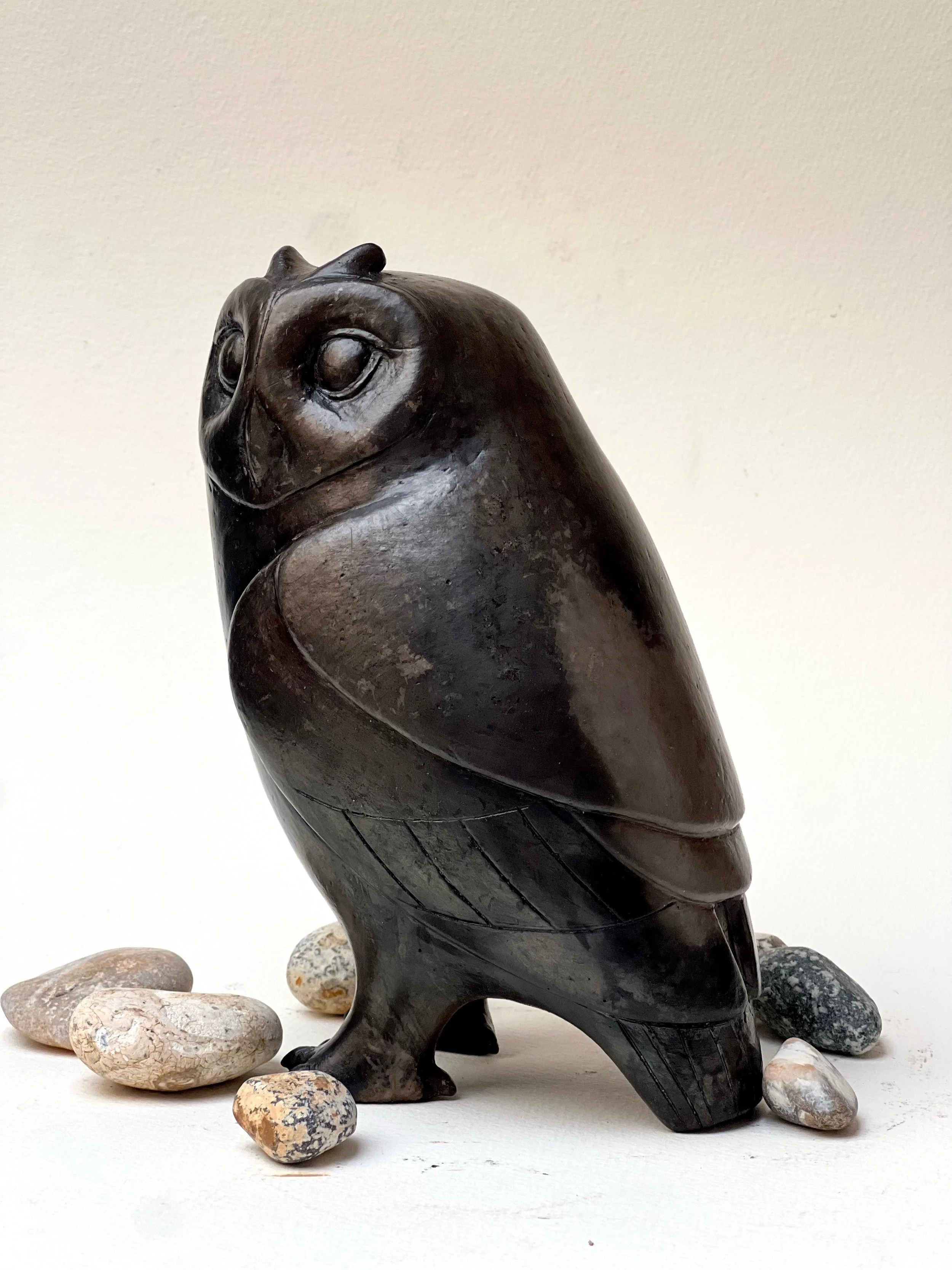 Often I hear tawny owls when I sit in my shed at night. I love owls. So had to make some. 
These sculptures are left unglazed and only coloured black by the smoke after firing them. 
Most of them have flown off to new homes, thank you so much those w