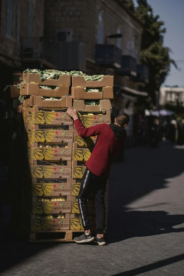 Man delivering bananas to a restaurant