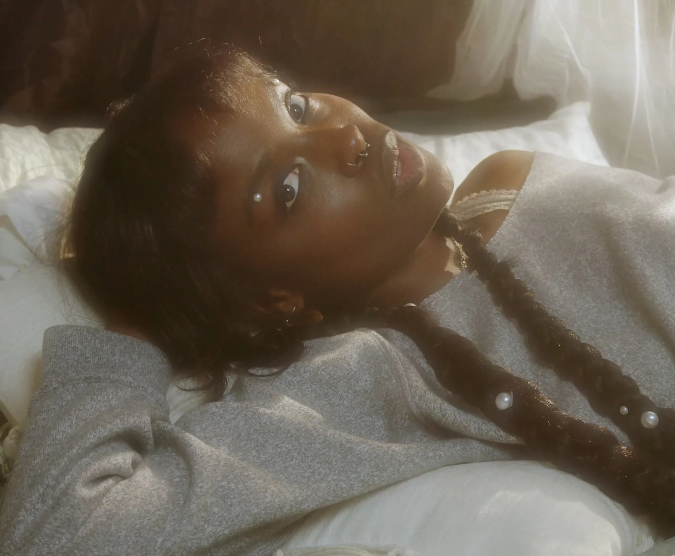 Woman posing on bed