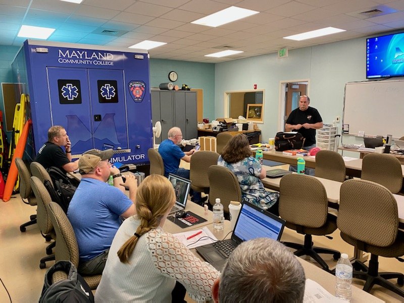 EMS Wizard classroom seen from the back, instructor at the front.