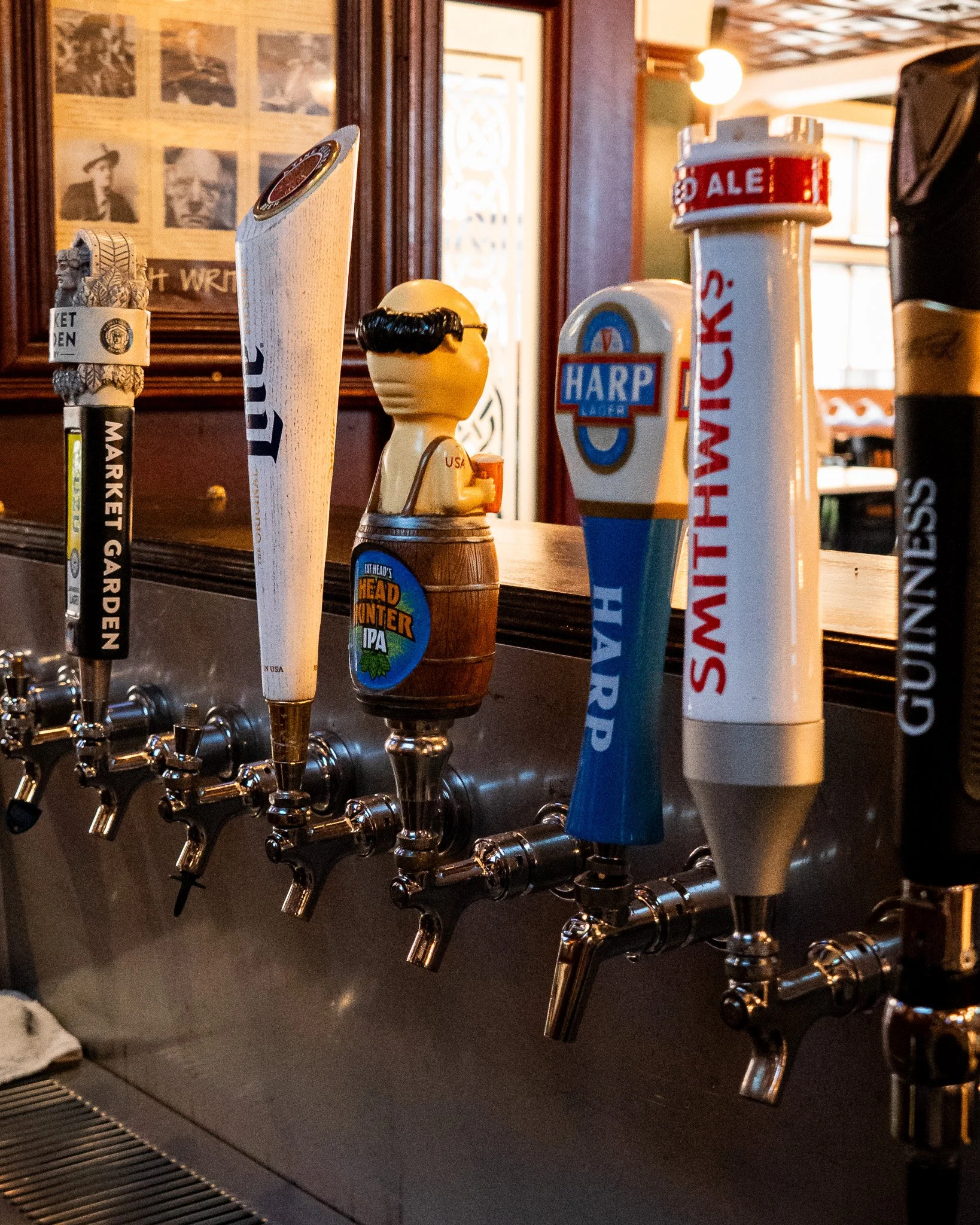 Rotating selection of draft beer taps at Flannery's Pub in Downtown Cleveland