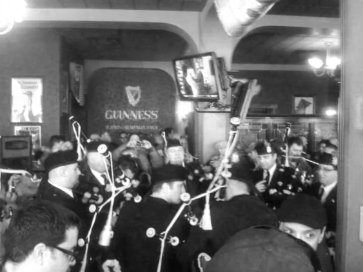 Irish music group performing with bagpipes at Flannery's Pub on St.Patrick's Day in Downtown Cleveland