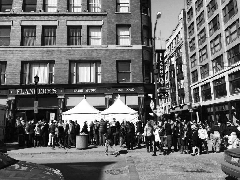People gathered outside Flannery's Pub celebrating St.Patrick's Day in Downtown Cleveland