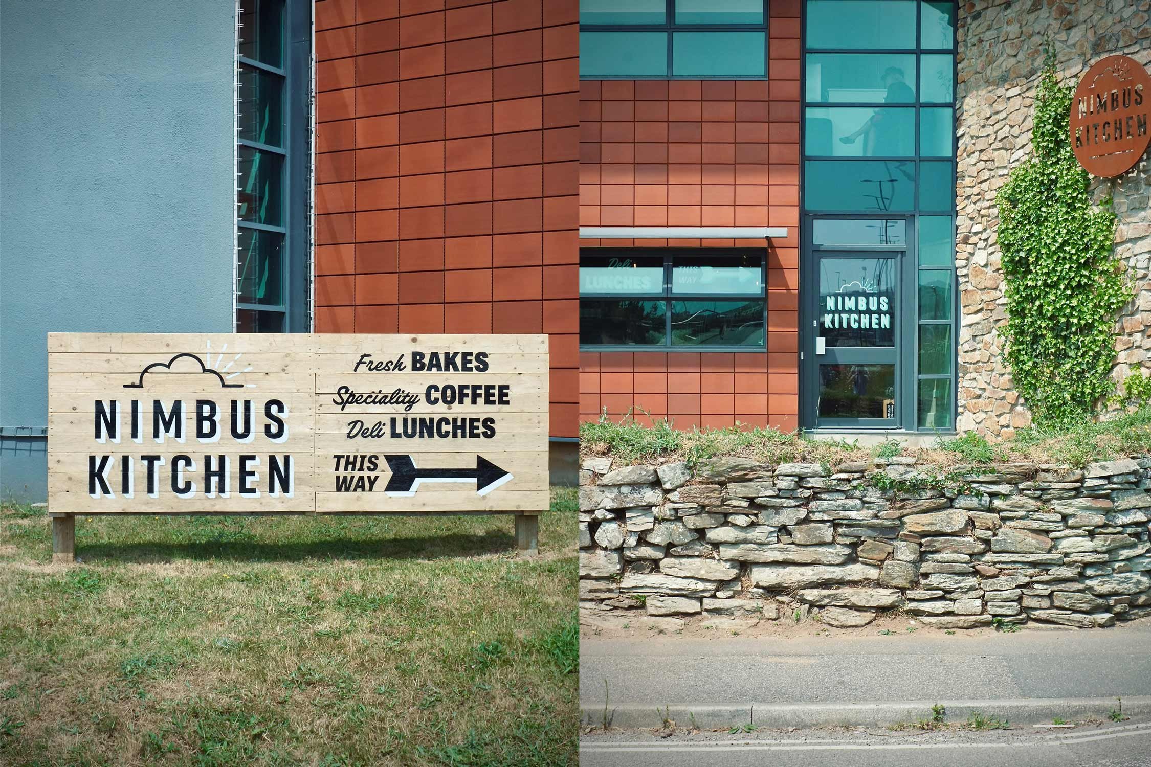 Traditional hand-painted wooden billboards and architectural exterior signage for Nimbus Kitchen in Redruth, Cornwall.
