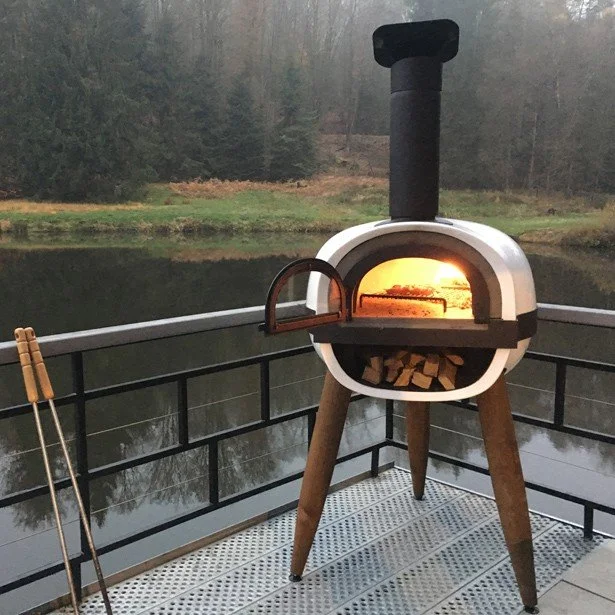 Pose de cuisnière, four et barbecue à bois