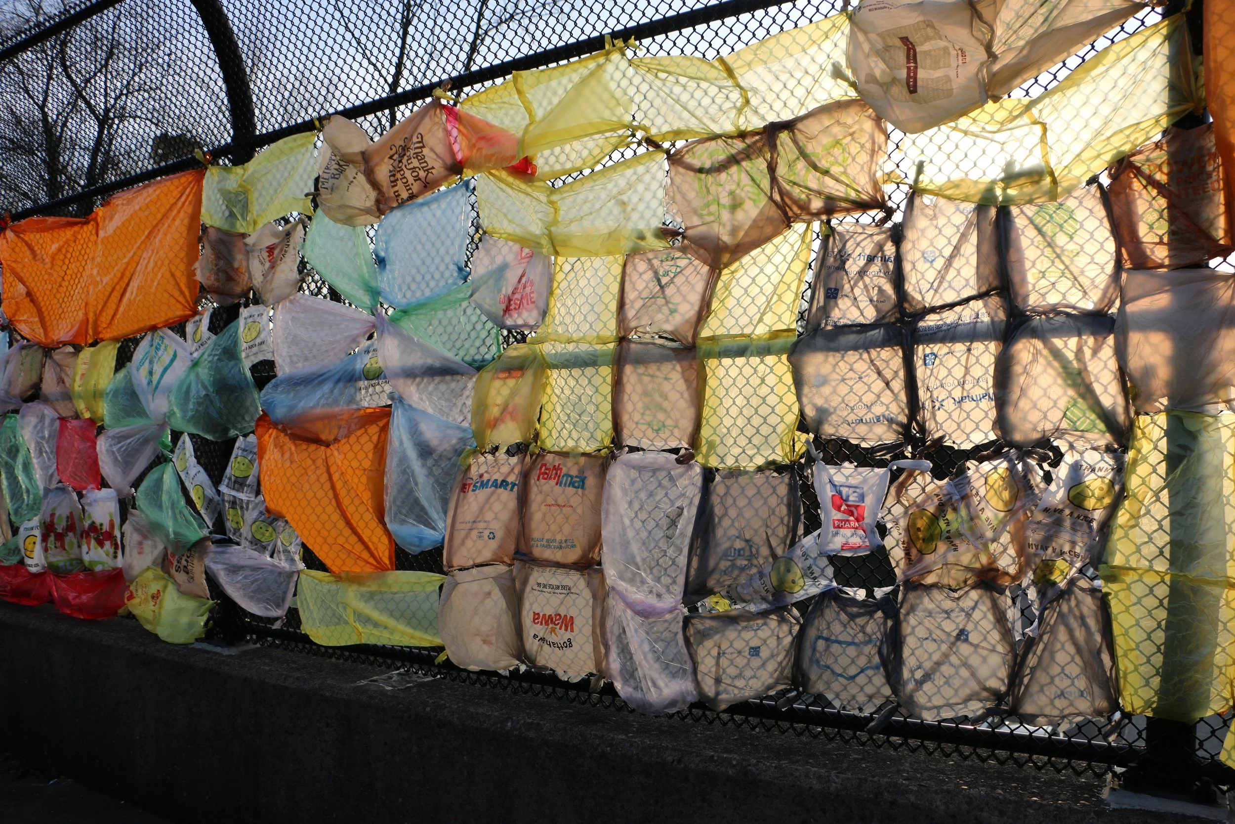 Contemporary artist Sarah Heyward's public art project near Philadelphia. Colorful recycled materials and community contributions.