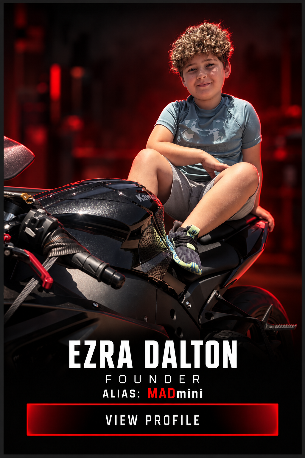 Promotional poster featuring young rider Ezra Dalton, founder of MADmini, sitting on a black Kawasaki sport motorcycle with red lighting.