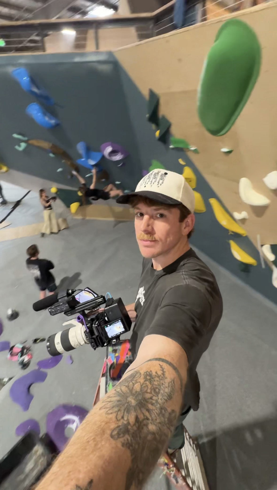 Brock Dion filming rock climbing for a new gym opening in seattle