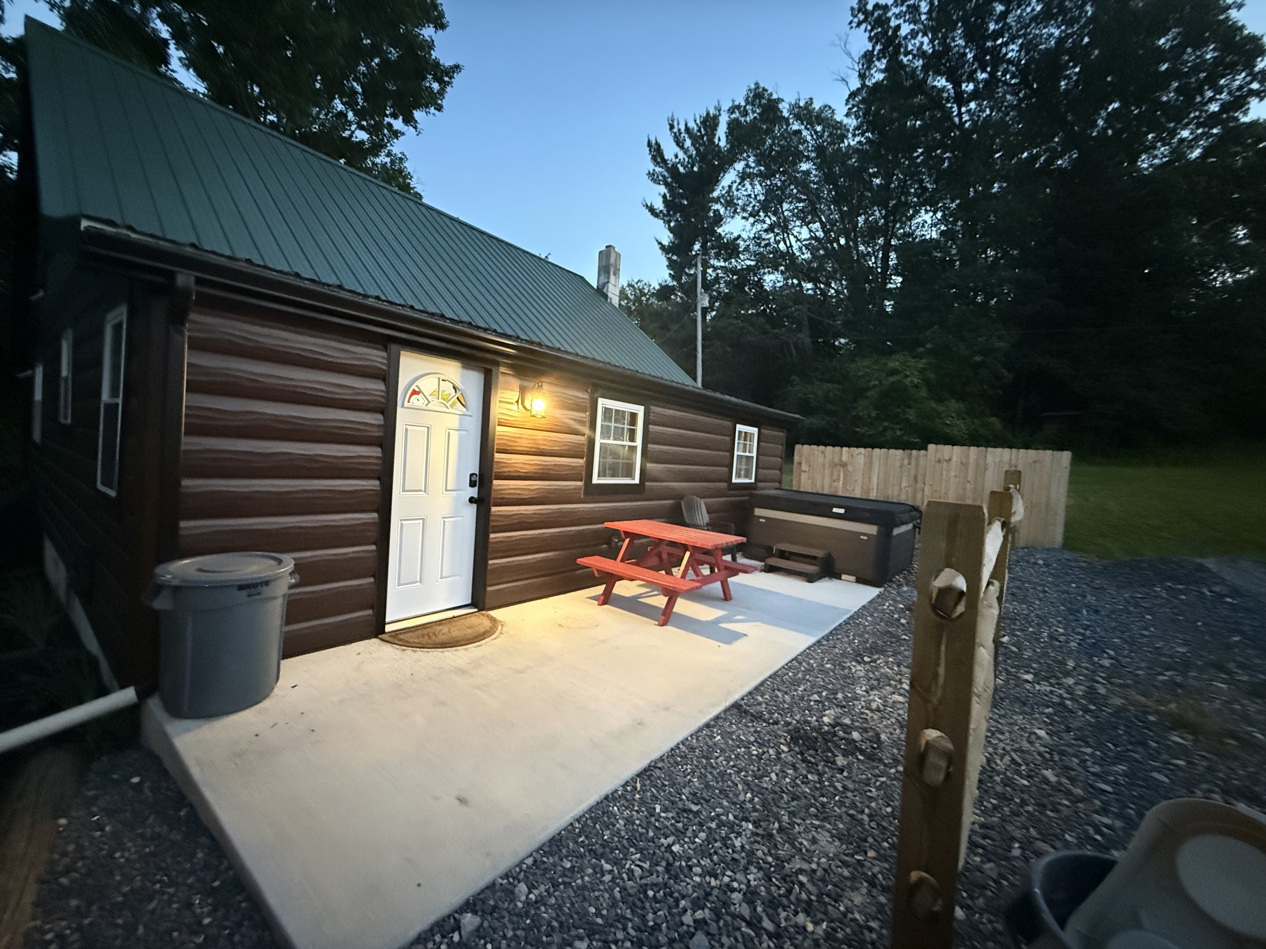 Hot tub is located on the back patio 