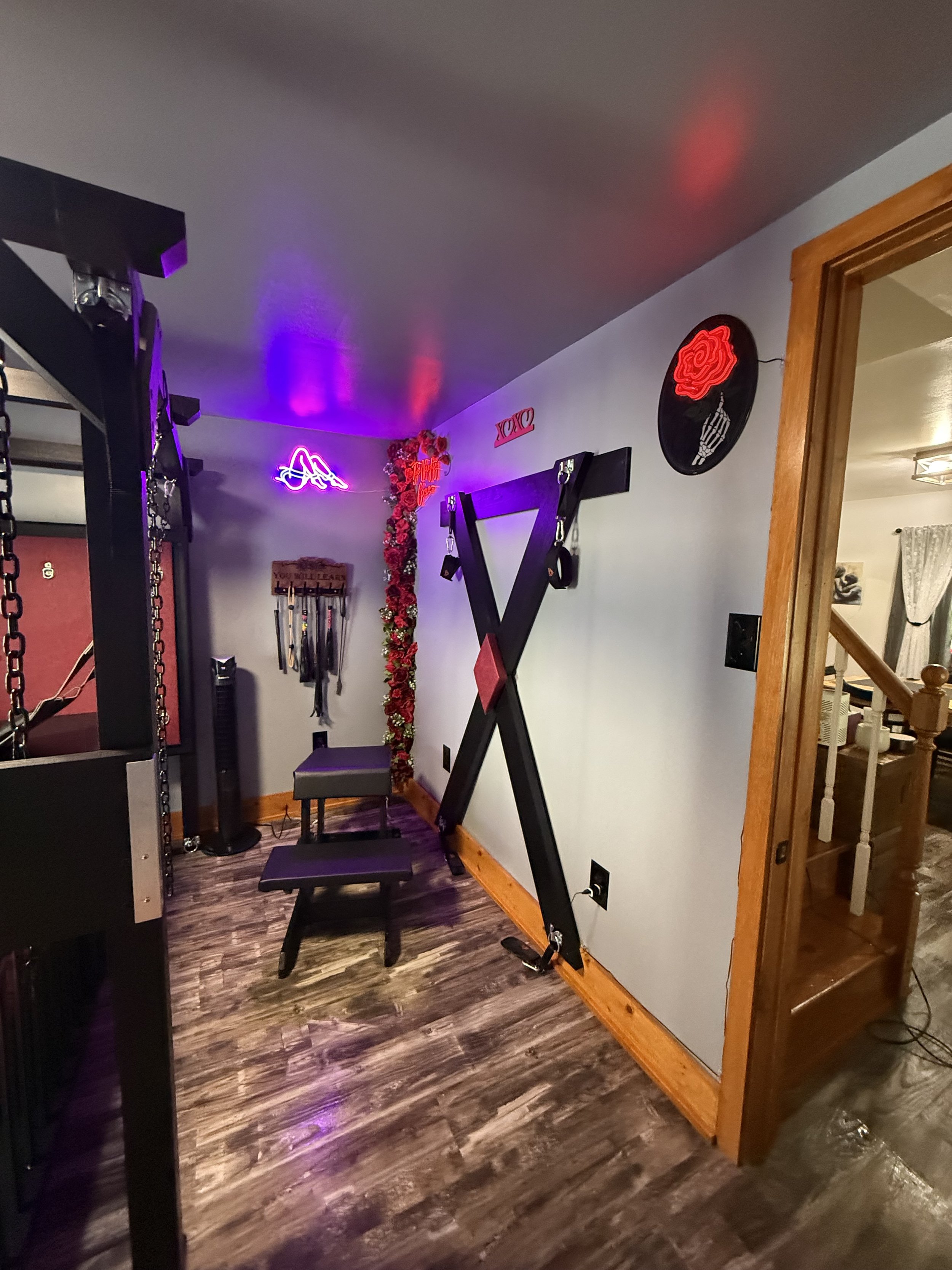 Full dungeon includes a St Andrew's cross, cage, prayer bench, spanking bench, and a swing.  There is extra floggers, paddles and blindfolds for guest to use.  
