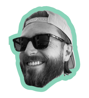 Smiling man with sunglasses and a backward baseball cap