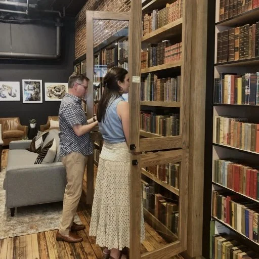 Shopping the shelves of rare, used, and antiquarian books inside Addison’s bookstore