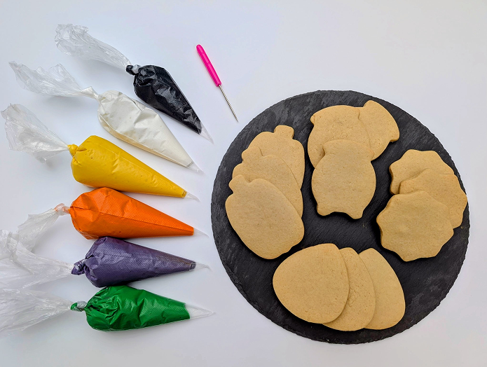 Piping bags and un-iced cookies