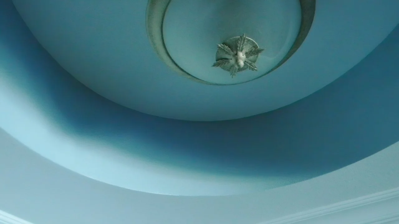 Repainted accent in foyer lighting.