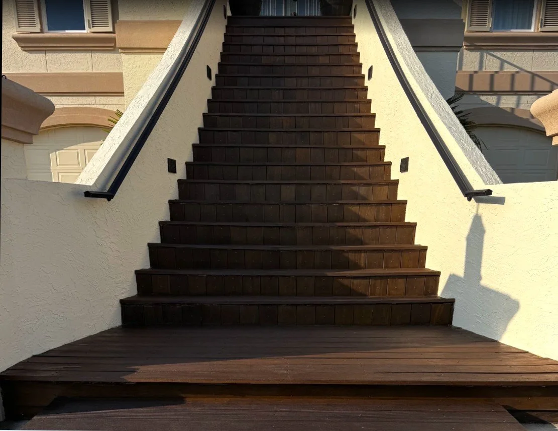 Restained stairwell and hand railings