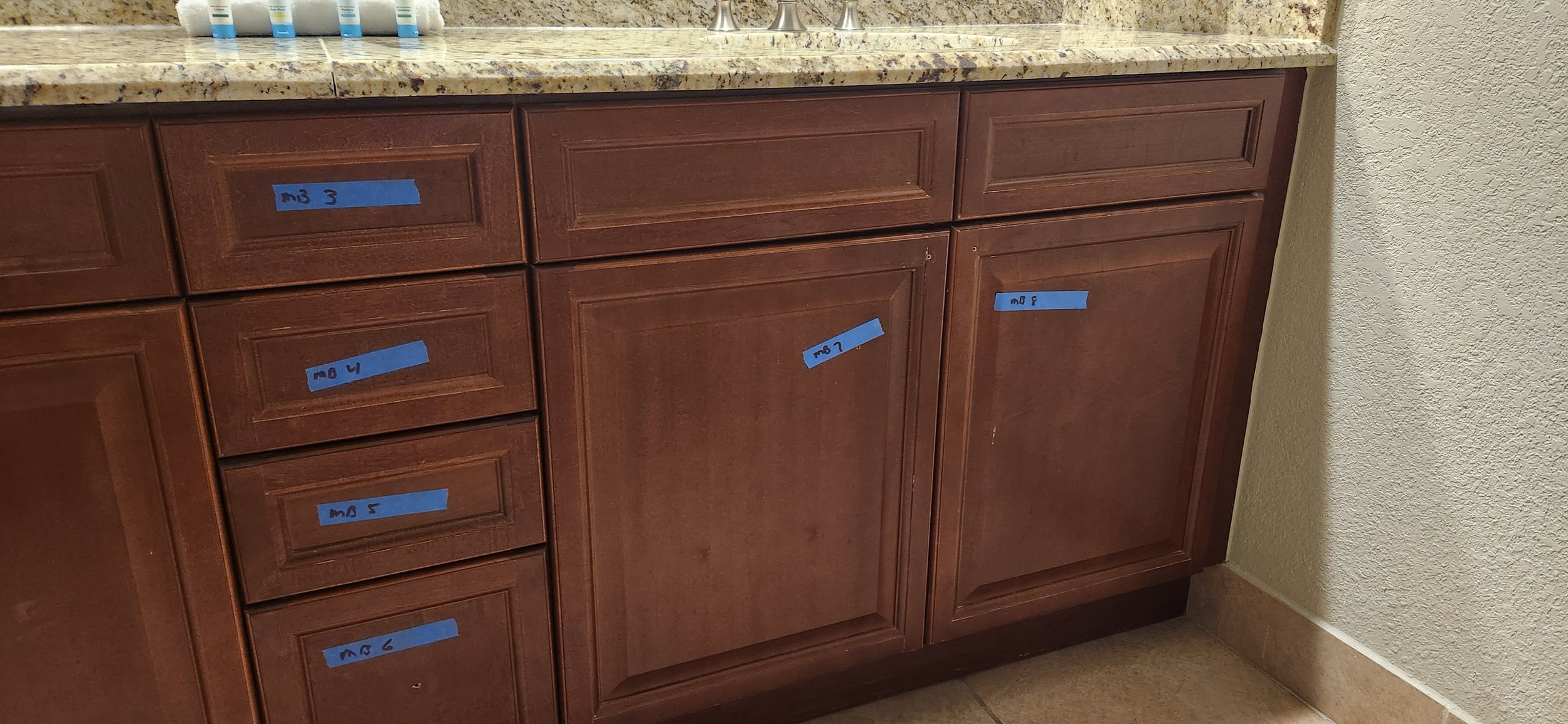 Bathroom cabinets BEFORE refinishing.