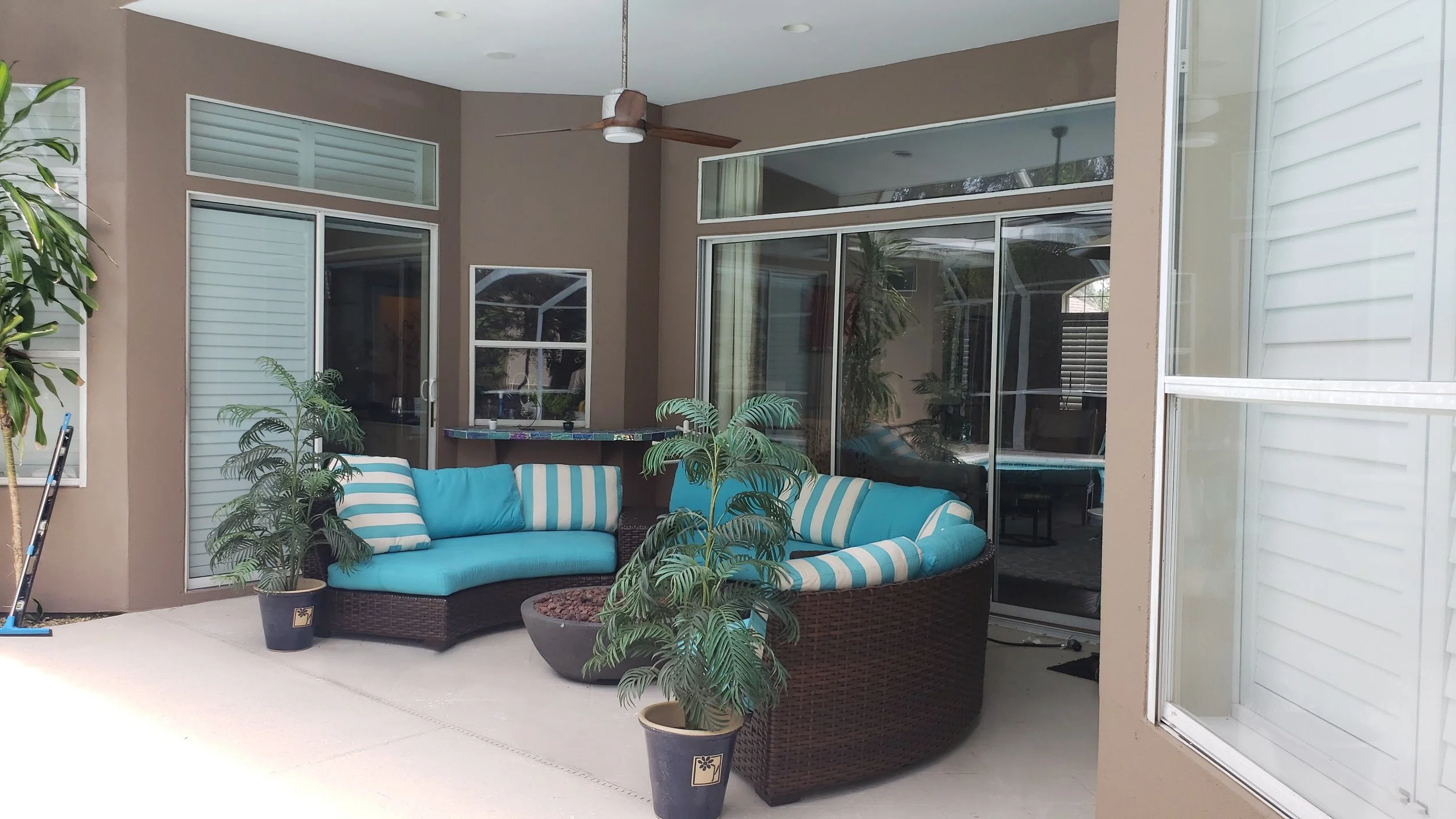 Stained pool deck with half moon seating.