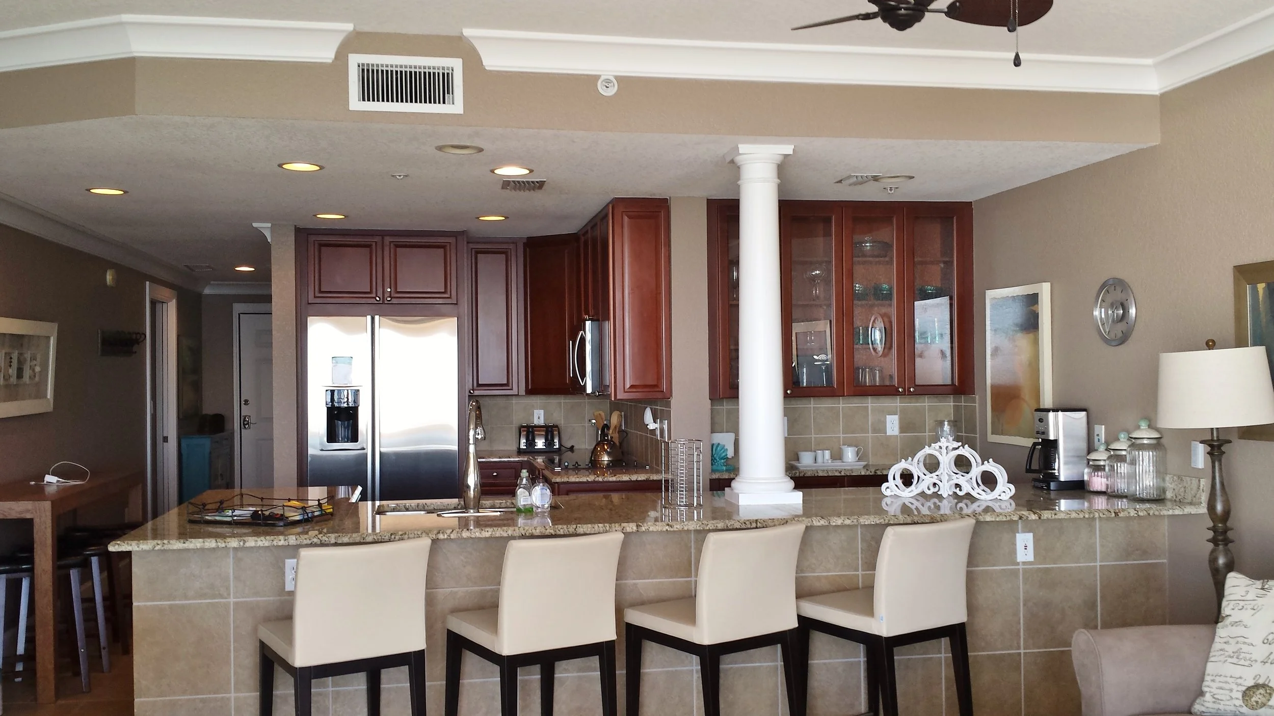 Repainted walls and stained cabinets.
