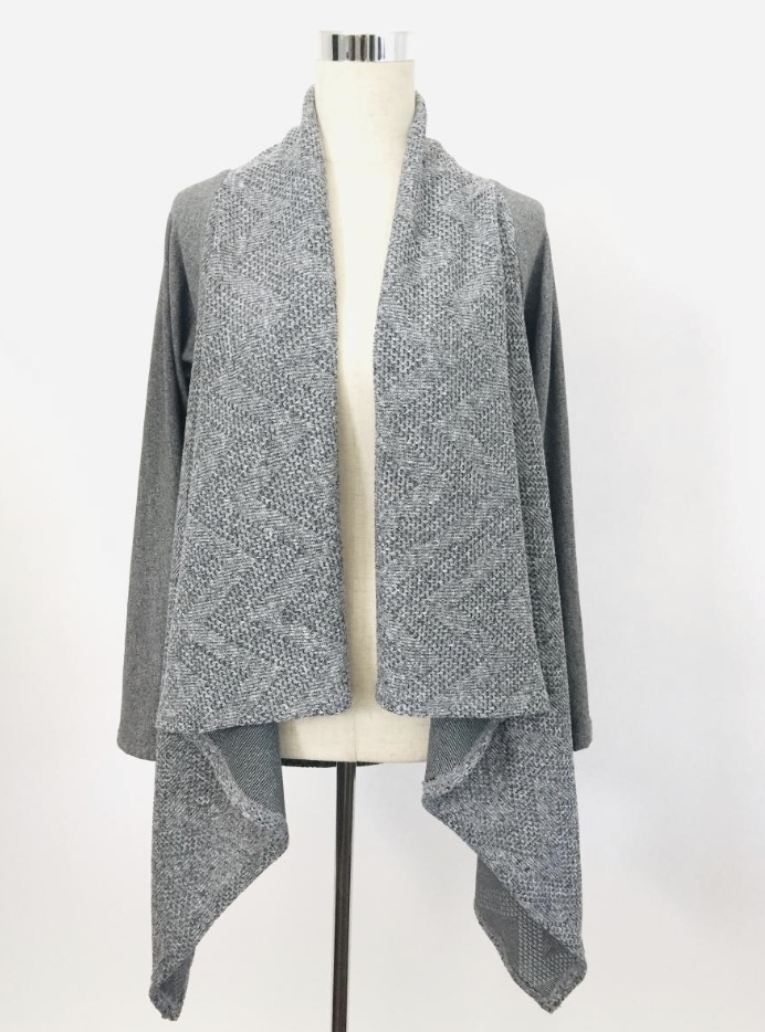 Mod Clothing - Grey patterned cardigan draped over a mannequin with a white background.