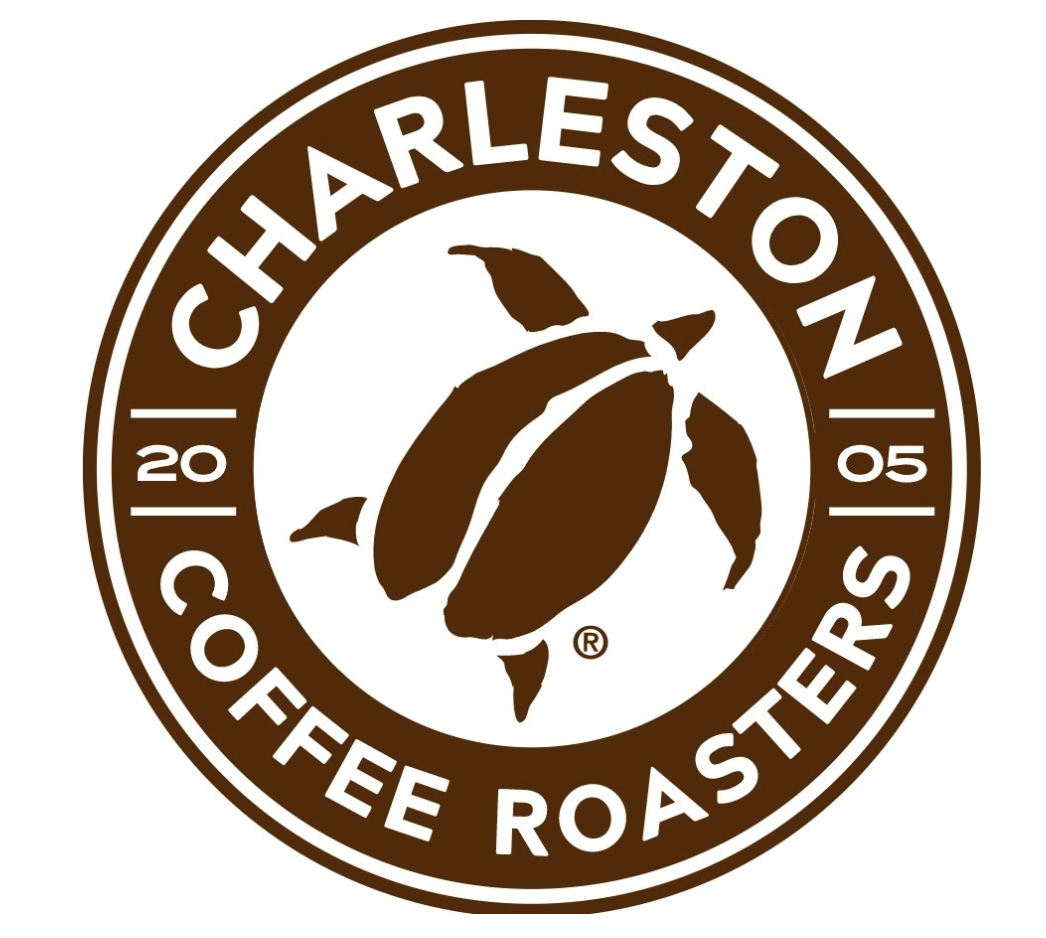 A circular logo for Charleston Coffee Roasters with a brown and white color scheme, featuring a coffee bean and leaf central image, and the text 'Charleston Coffee Roasters' around the circle with '20 05' split on either side.