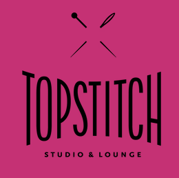 Pink background with black text that reads "TOPSTITCH Studio & Lounge" and sewing needles crossing at the top.