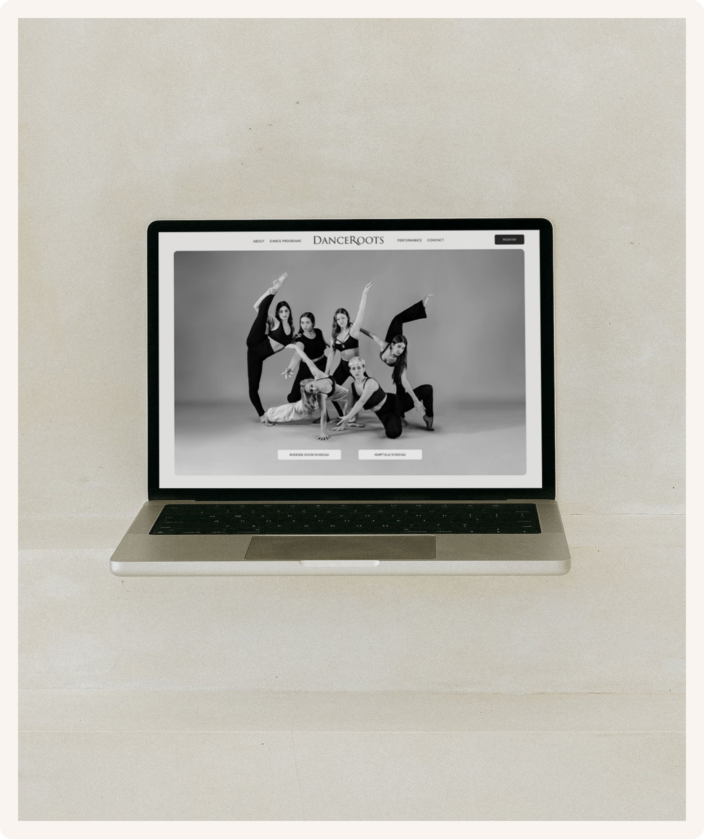 A laptop displaying a website for Danceroutes, featuring a black-and-white photo of six dancers in dance poses on a gray background.