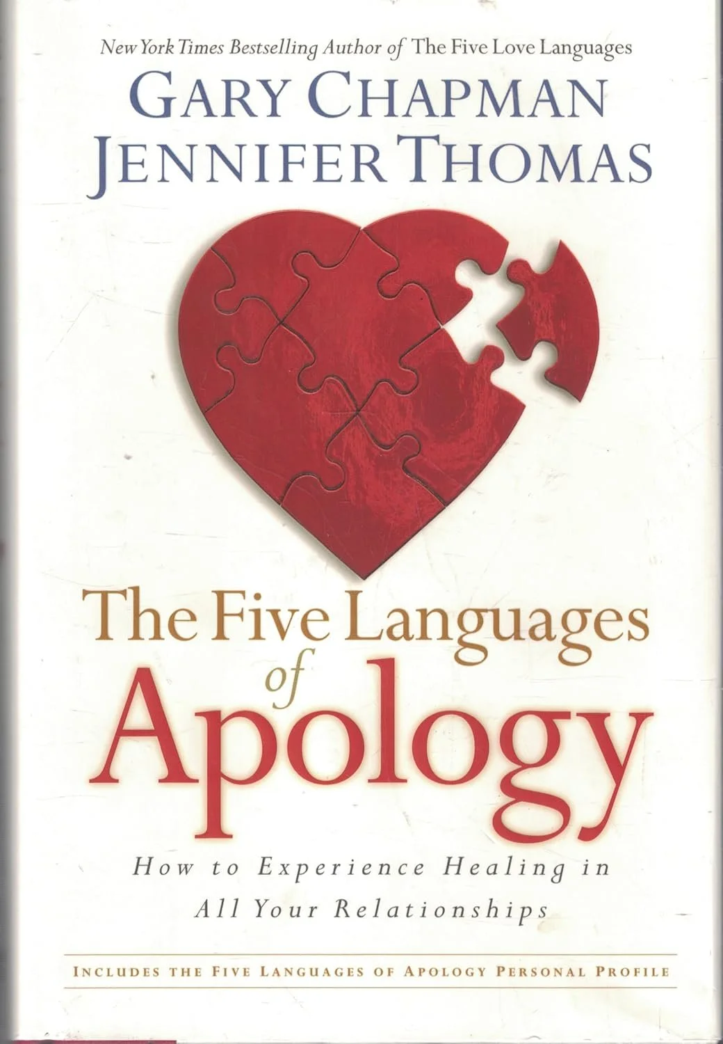 Book cover titled 'The Five Languages of Apology' by Gary Chapman and Jennifer Thomas, featuring a broken red heart puzzle.