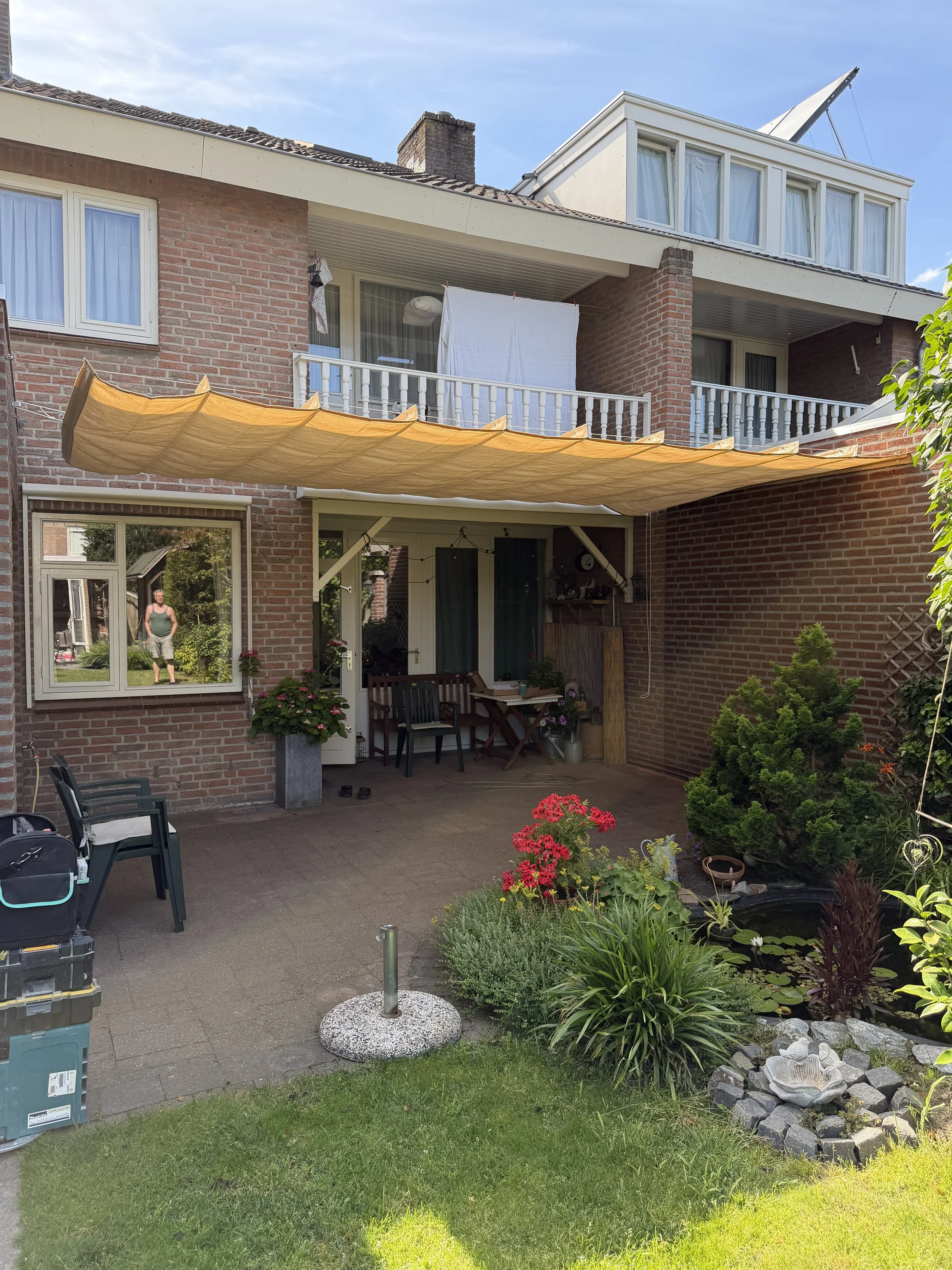 Schaduwdoek ophangen