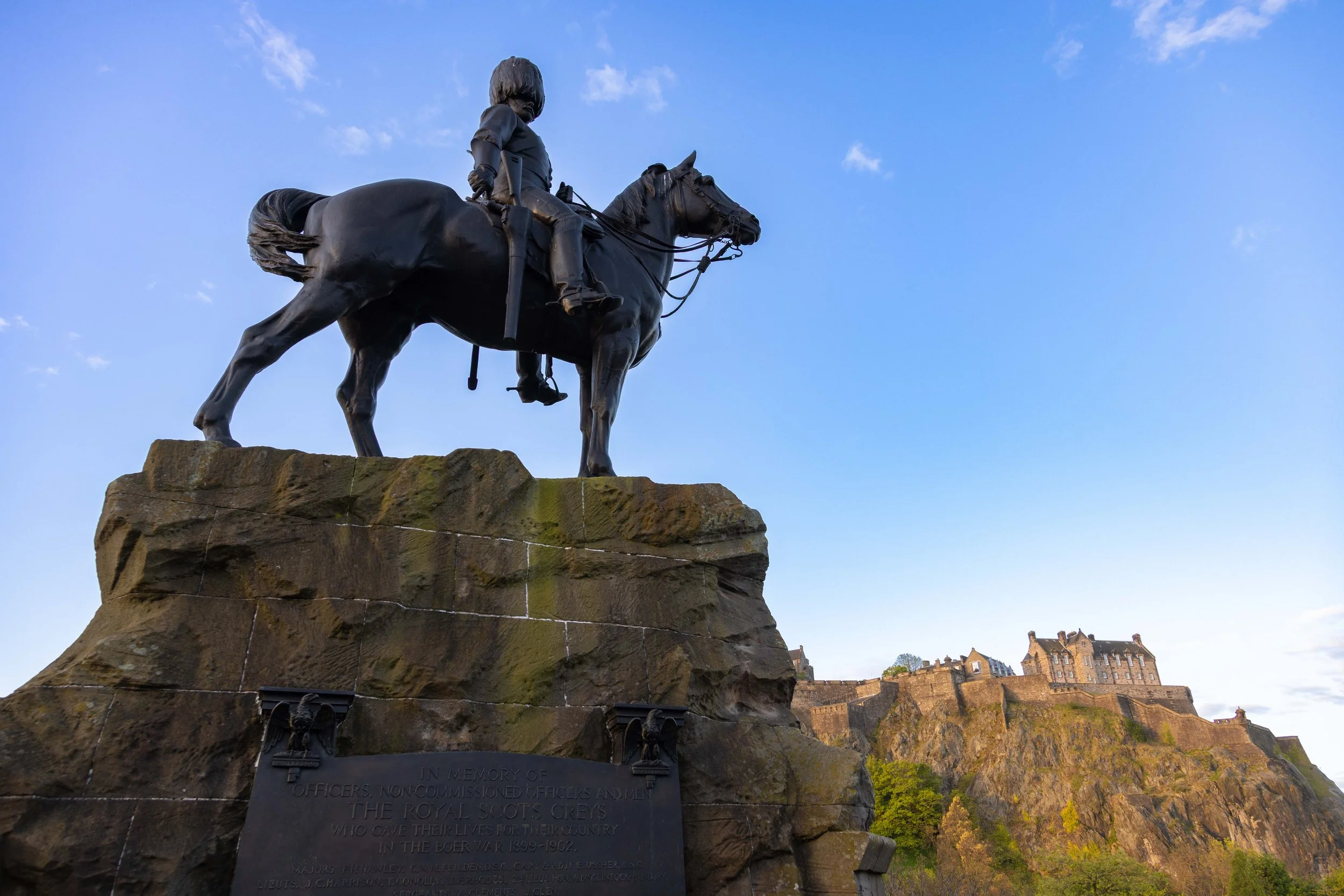 Edinburgh Castle and one of the many monuments displayed around the city. 