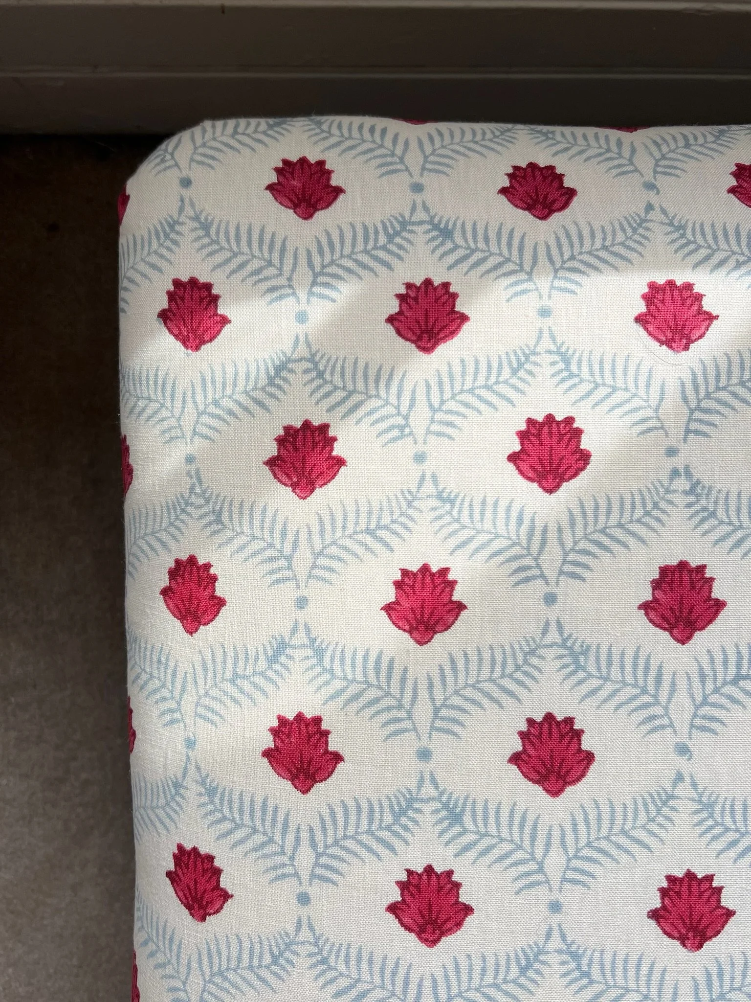 Closeup of a bespoke upholstered footstool