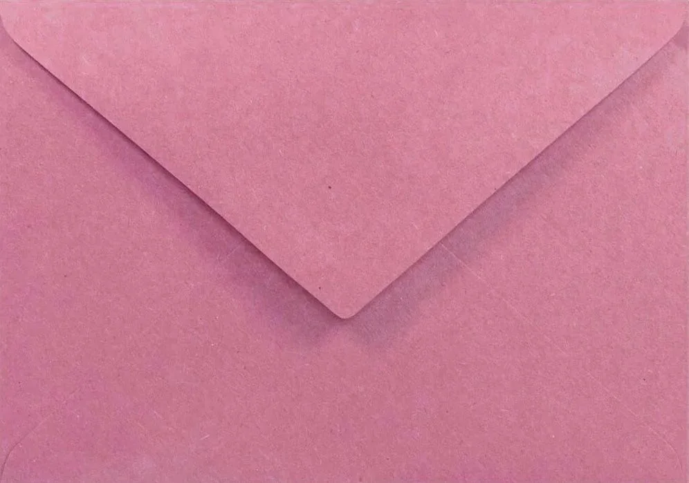 A pink paper envelope with the flap closed.