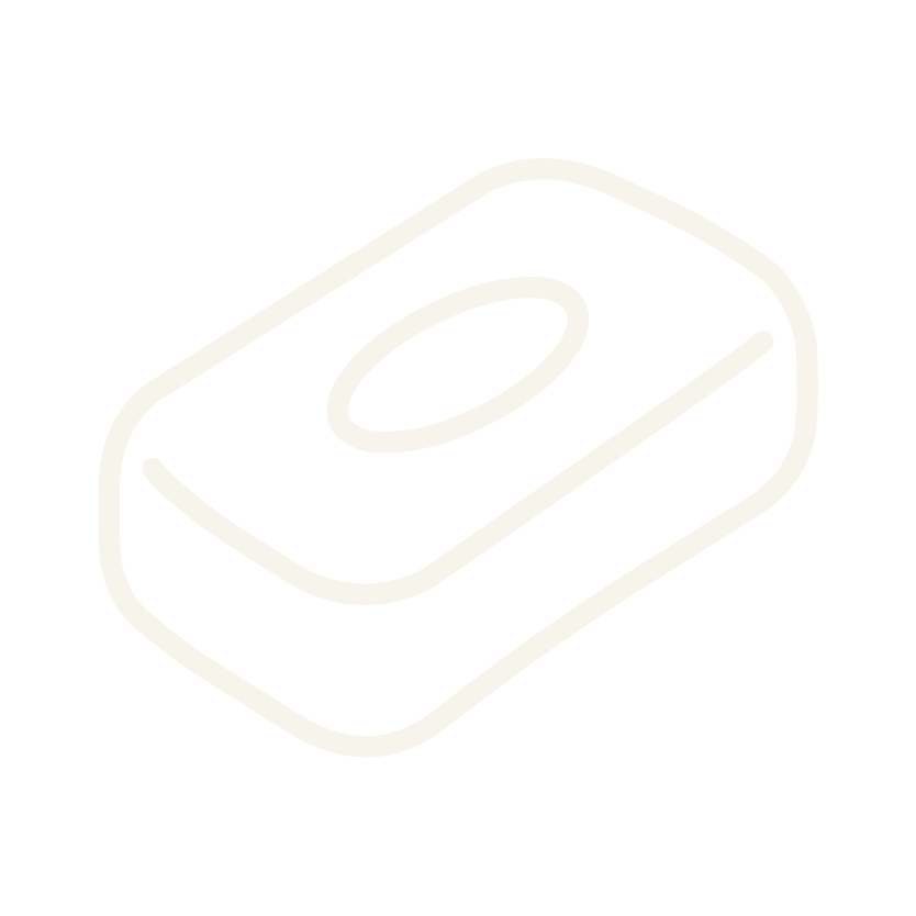 Outline drawing of a bar of soap with a circular hole in the center.
