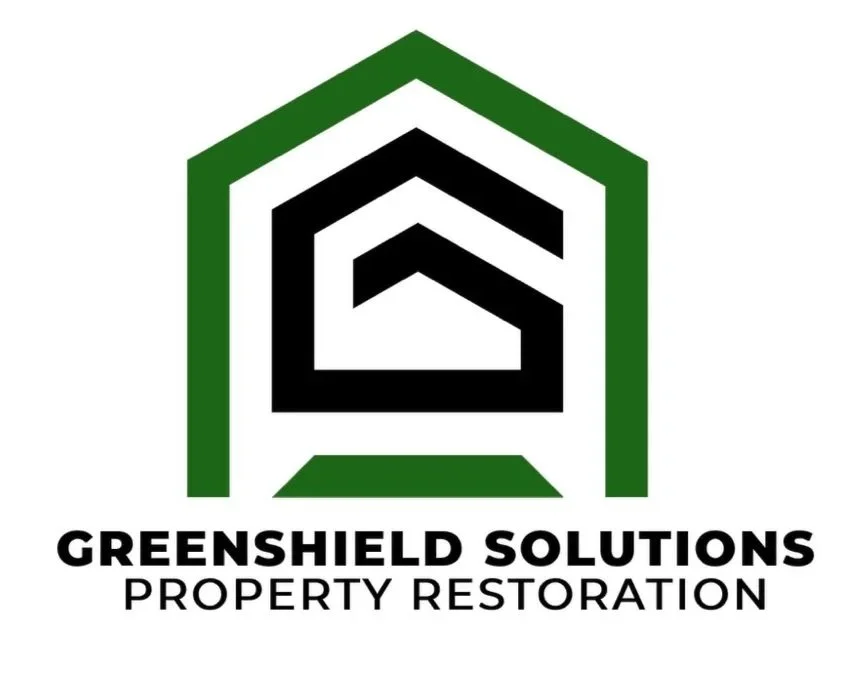 Logo for Greenshield Solutions, a property restoration company, featuring a stylized house outline in green and black with the company's name below.