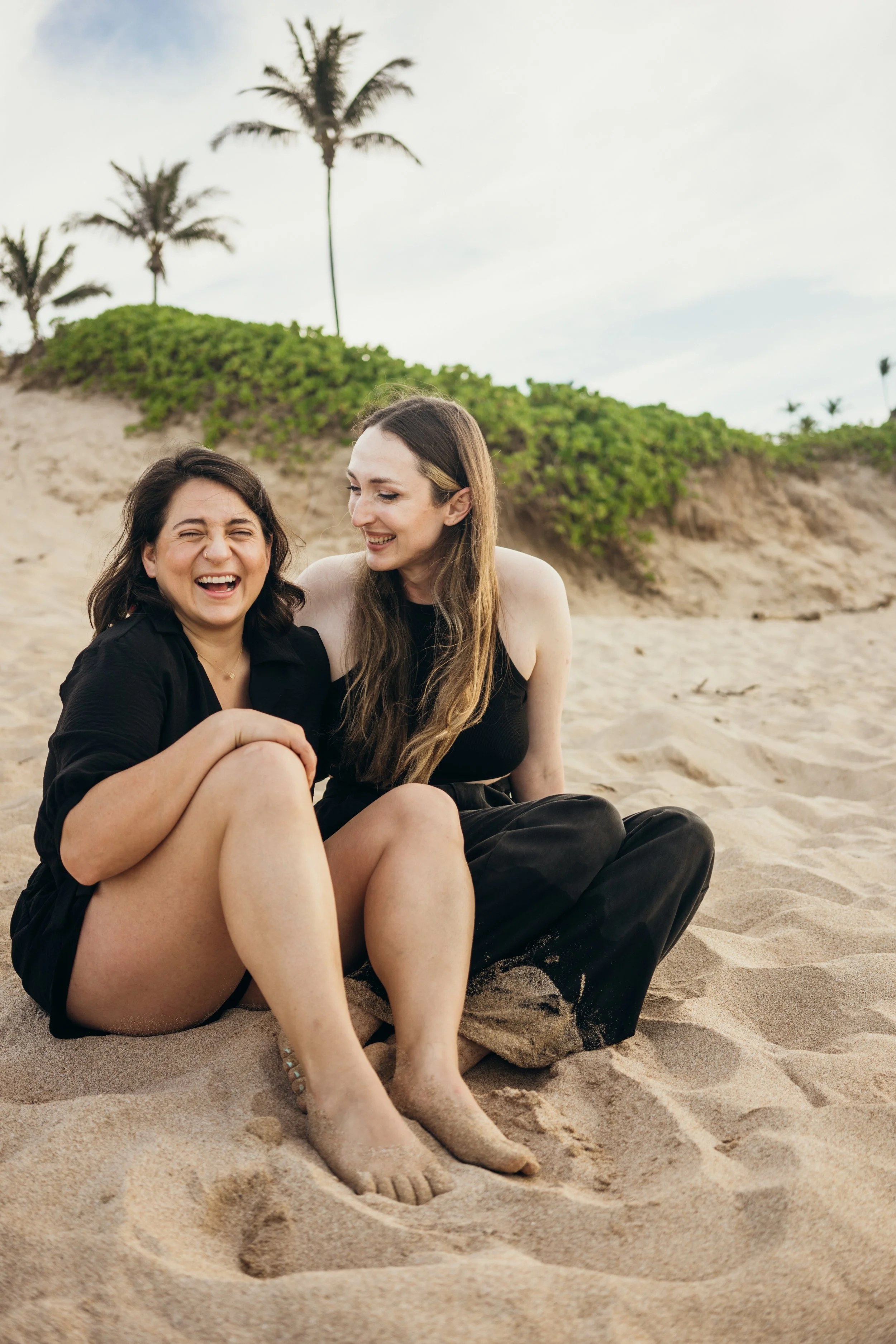 This queer engagement-inspired session takes place in downtown Denver with a same-sex couple sharing a quiet emotional moment. The urban environment adds depth and contrast to the romantic connection. The photographer focuses on LGBTQ+ storytelling a
