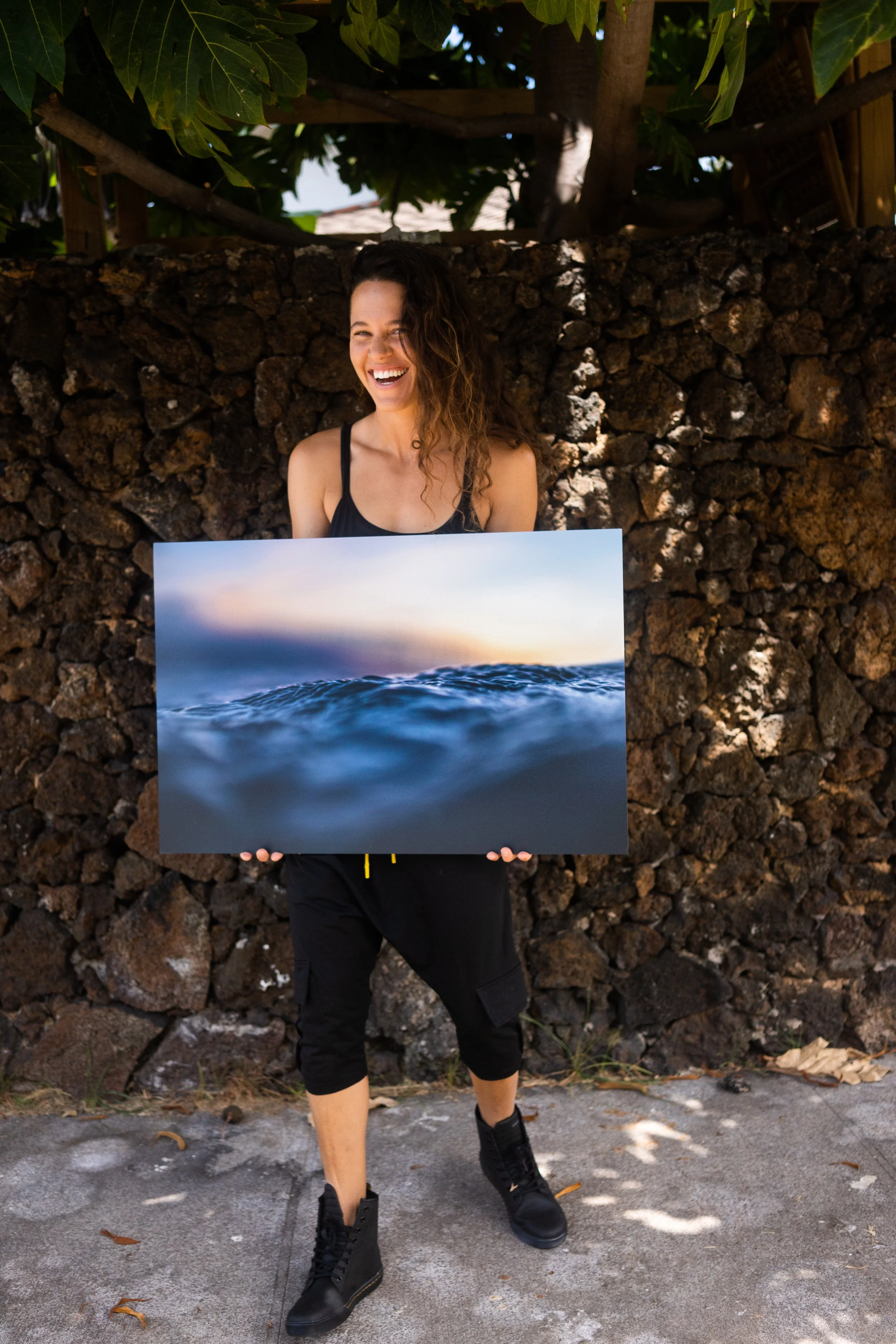 Rachael with her camera and fine art photography, ready for the next adventure. Whether photographing a mountain elopement or a small business owner, she approaches every story with curiosity and connection.