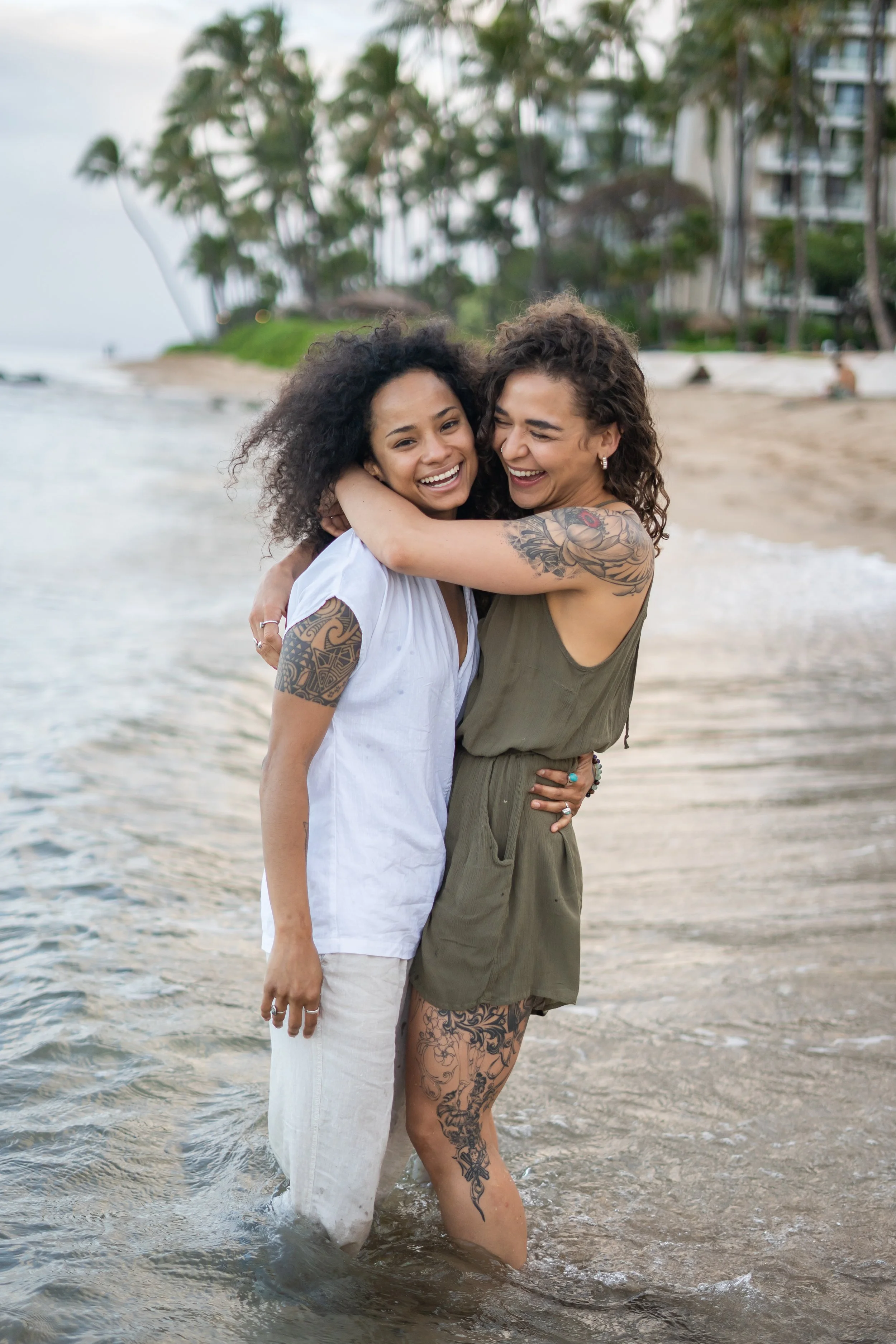 A lesbian couple is captured in a Colorado foothills session with soft mountain light. The interaction is candid and emotionally expressive. This LGBTQ+ photographer works across Denver, Colorado Springs, and Rocky Mountain landscapes. The storytelli