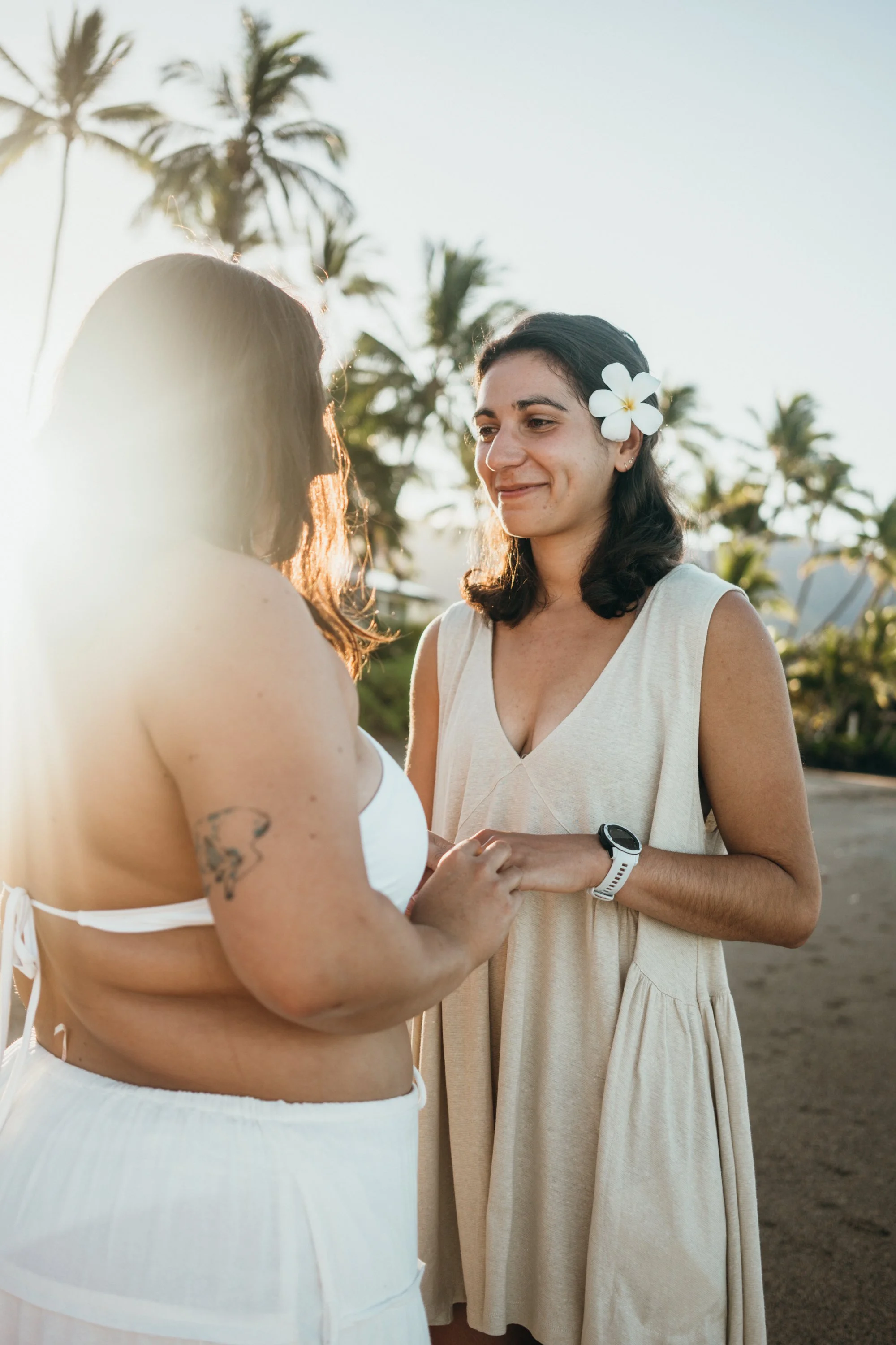 A romantic proposal unfolds on a quiet beach during early morning light. The ocean reflects pastel tones that frame the couple’s emotional reaction. This session reflects a documentary approach to engagement photography rooted in real moments. Althou