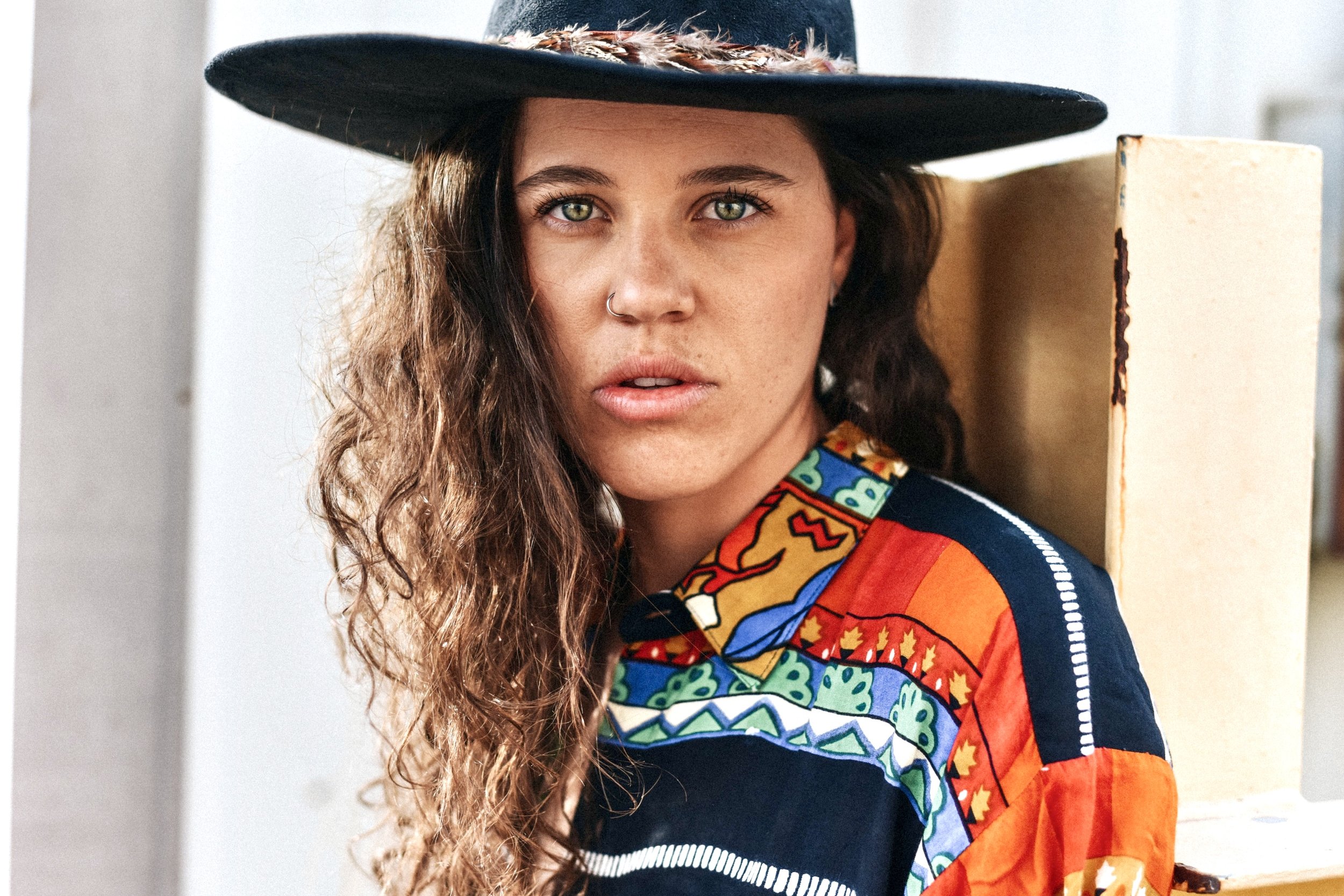 Award-winning photographer Rachael received the Jeanne Córdova Award for her contributions to LGBTQ+ storytelling and journalism. Her work continues to focus on visibility, representation, and authentic narratives.