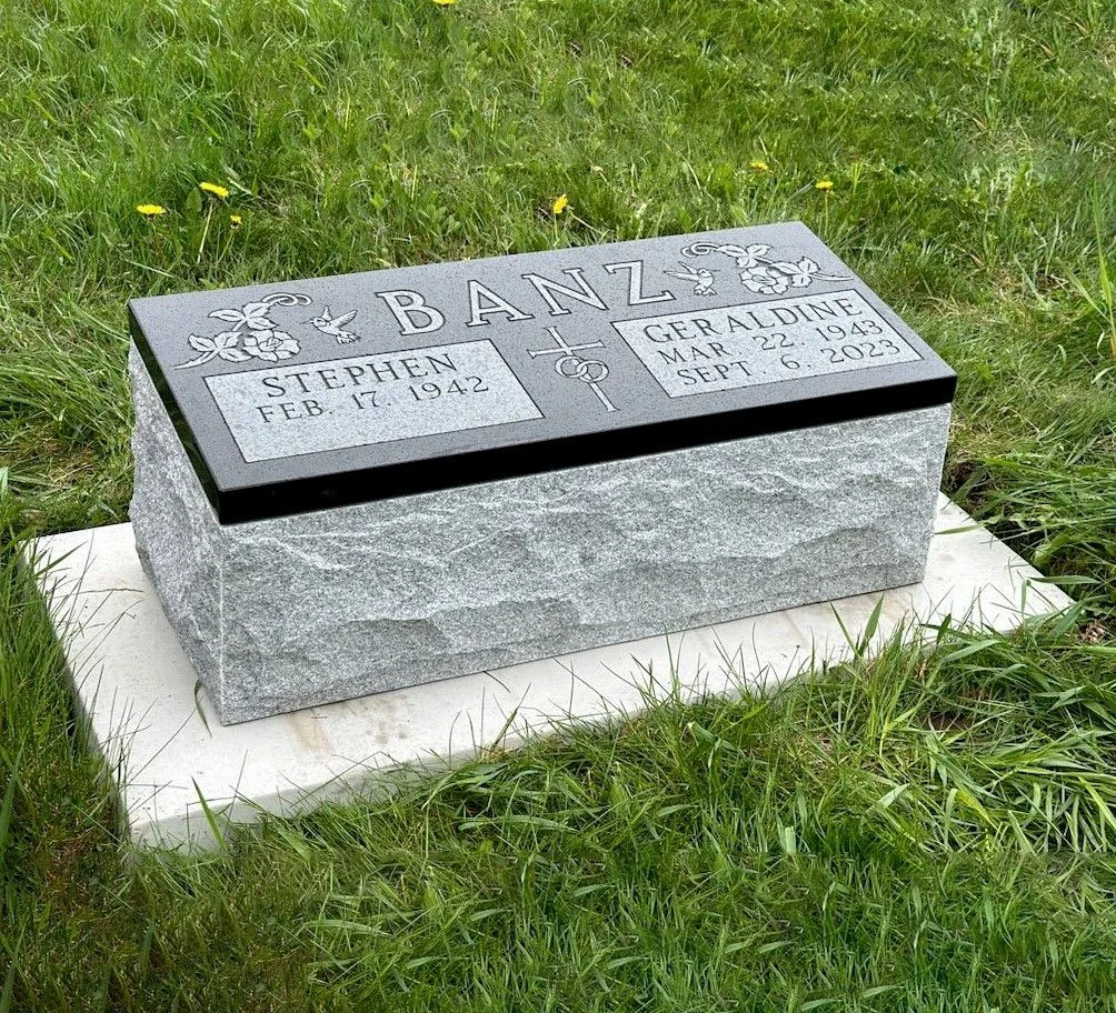 Gray granite cremation marker.