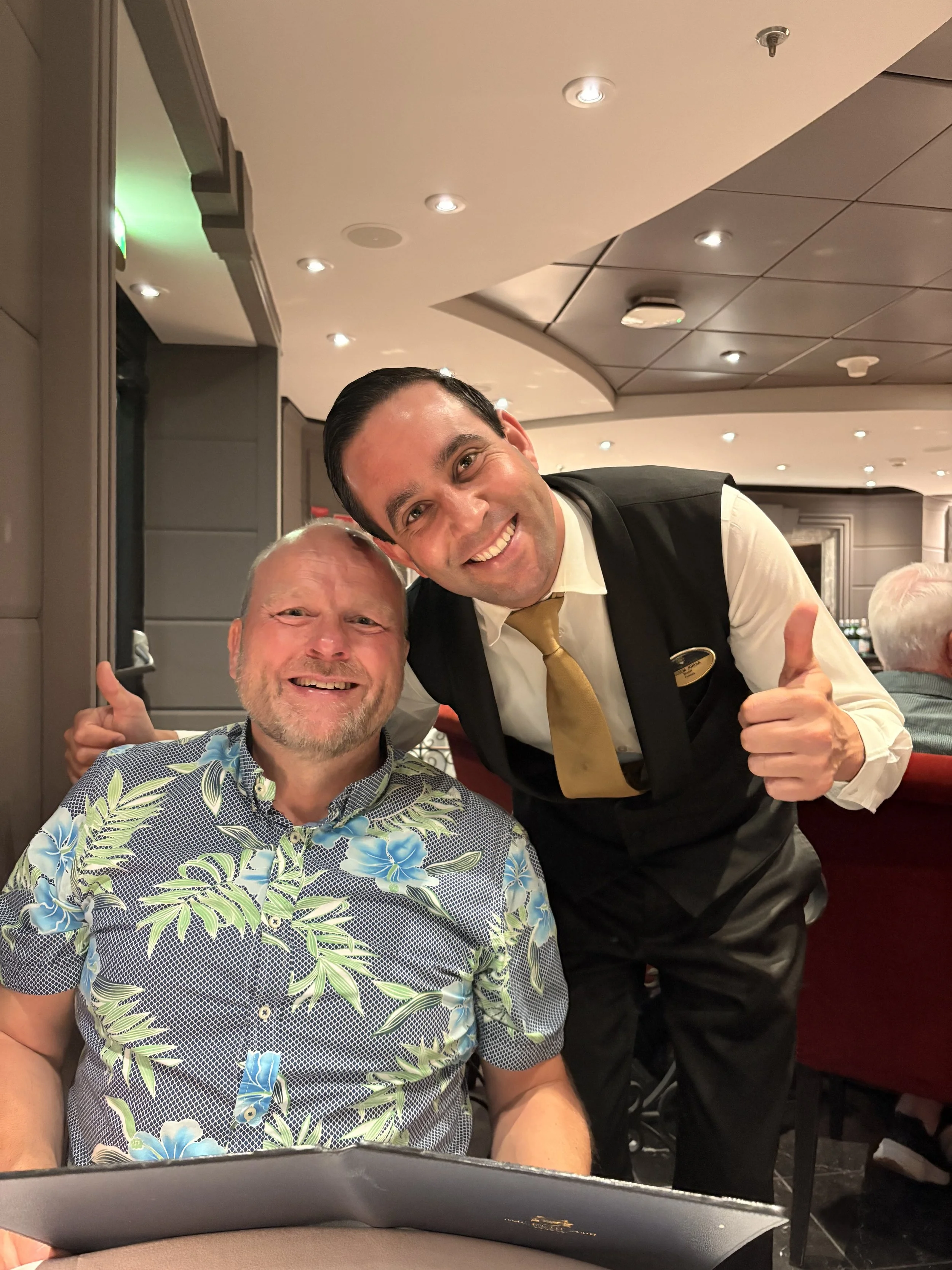 our always funny waiter in the Yacht Club restaurant