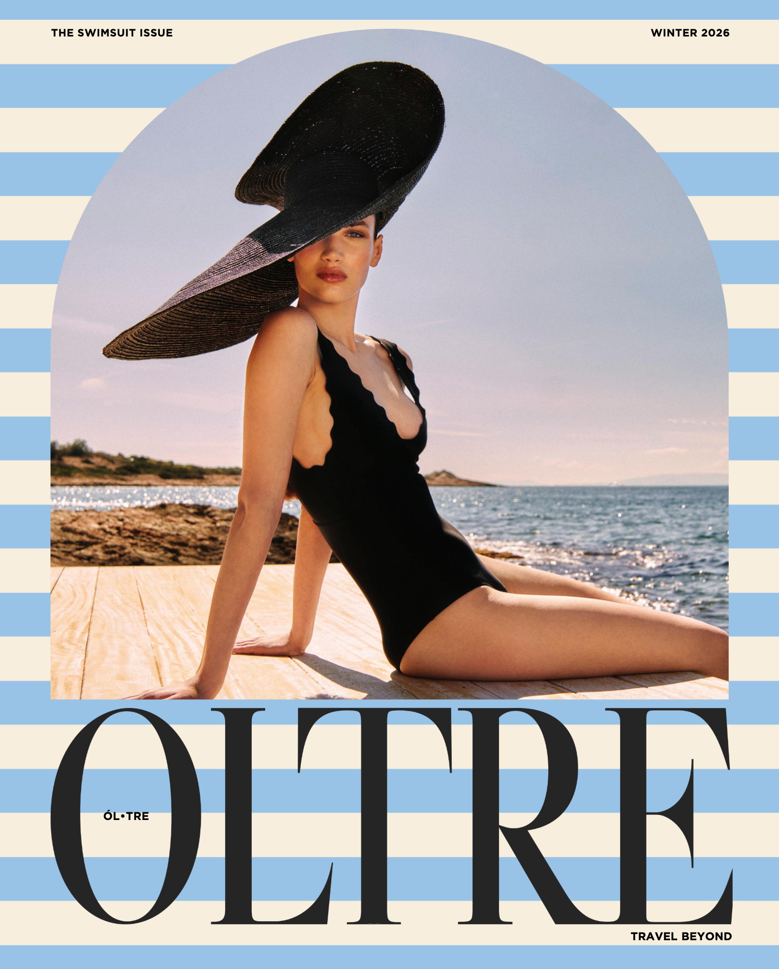 A woman in a black swimsuit sitting on a wooden dock by the water, wearing a large wide-brimmed black hat, with a beach and shoreline in the background, on the cover of Ocean magazine's Winter 2026 issue.