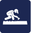 Icon of a person skiing downhill on snow